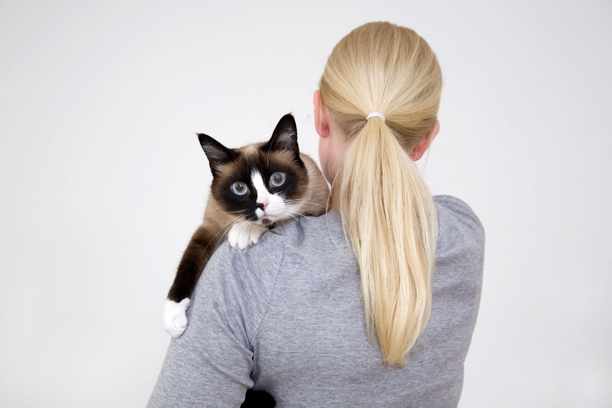 Young woman with cat