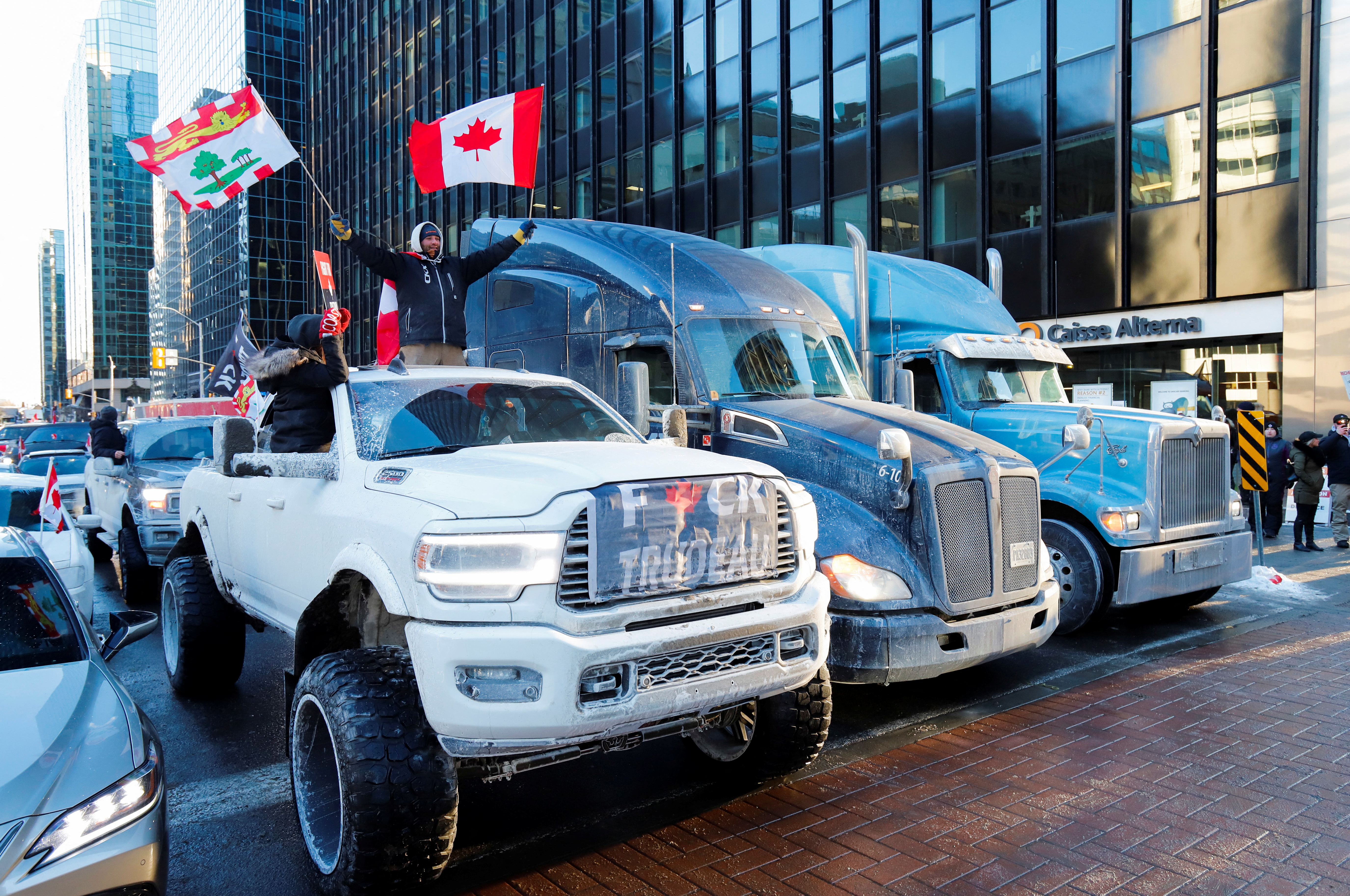 Truckers take part in a convoy and protest against COVID-19 vaccine mandate in Ottawa