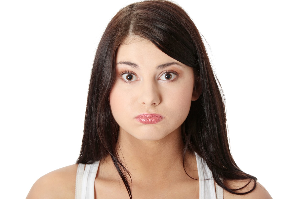 Young woman with hiccup