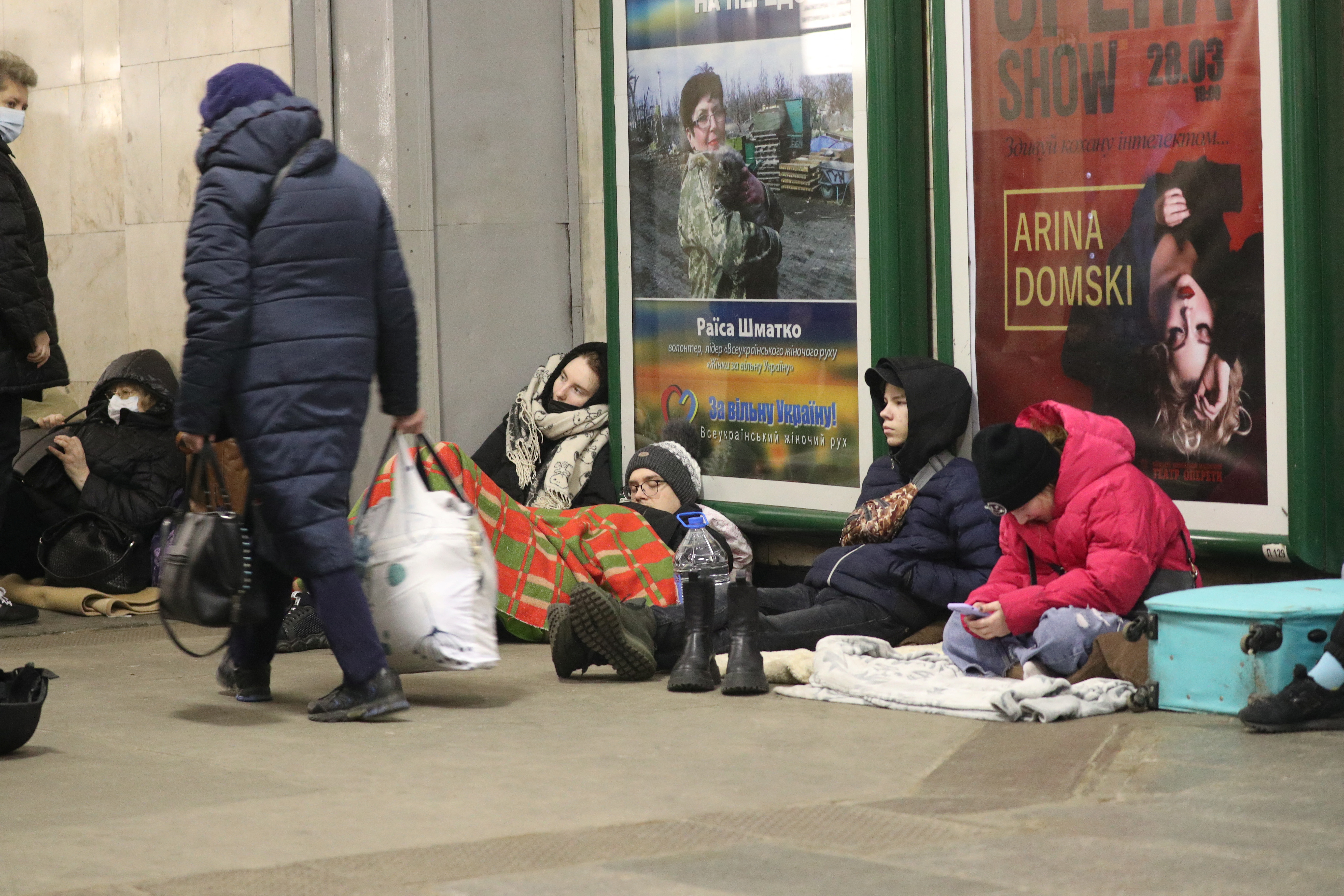 People gather in a metro station in Kyiv