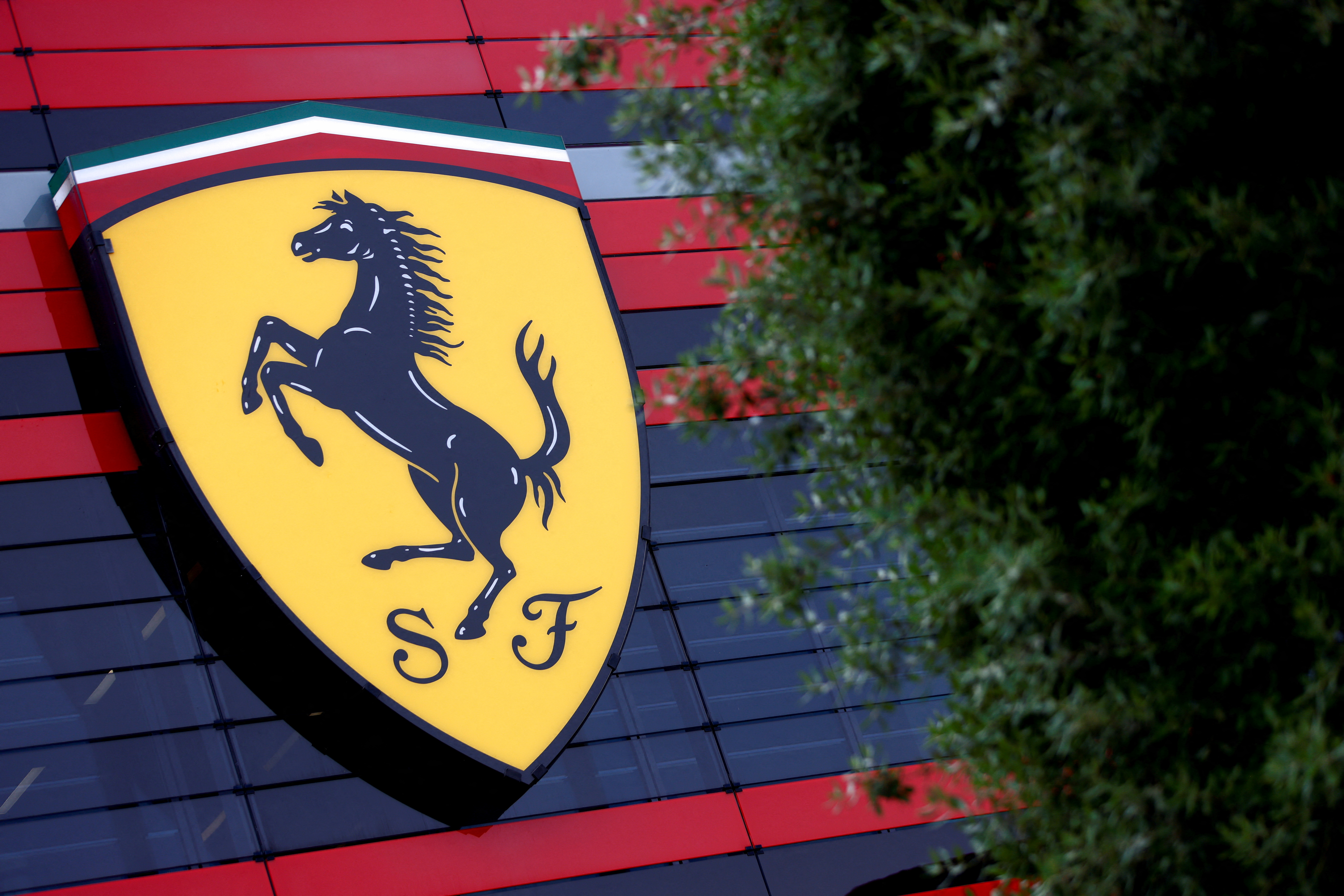 FILE PHOTO: TheThe Ferrari logo is seen at the company's headquarters in Maranello, Italy