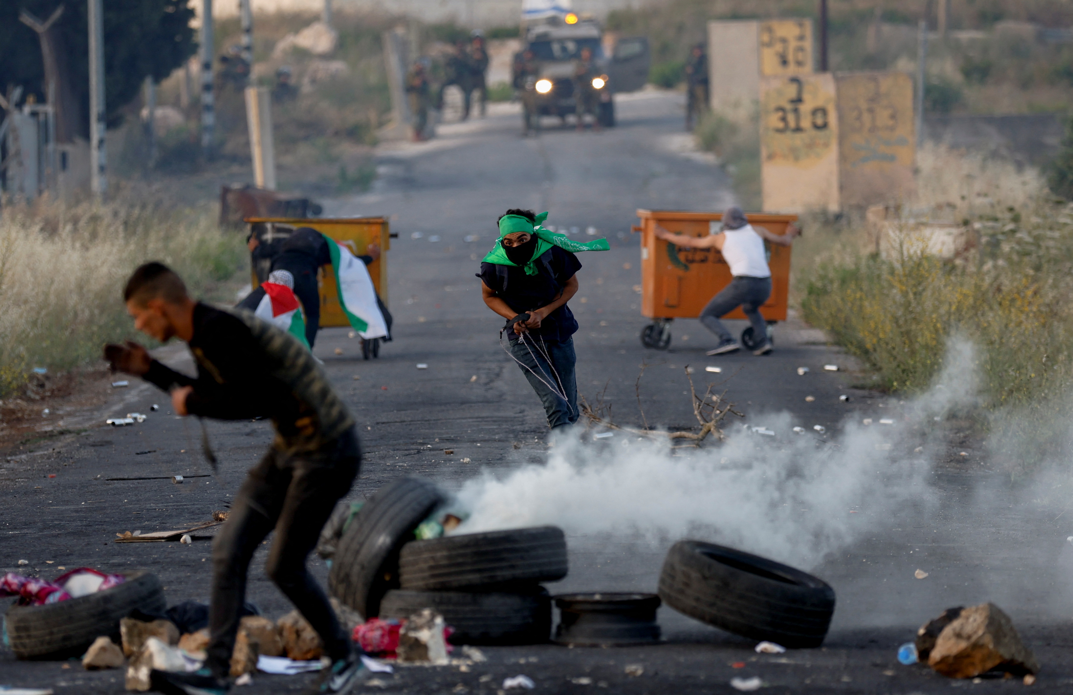 Palestinians protest over tensions in Jerusalem's Al-Aqsa Mosque, near Beit El