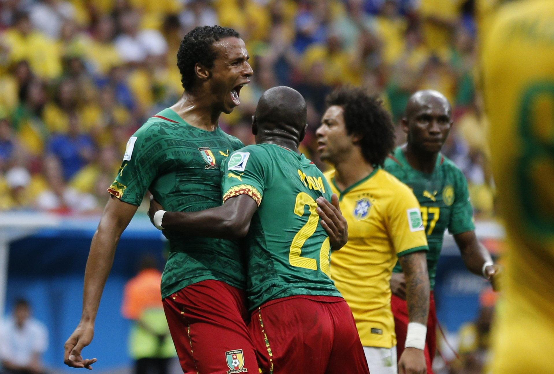 Cameroon's Matip celebrates his goal against Brazil during their 2014 World Cup Group A soccer match at the Brasilia national stadium in Brasilia