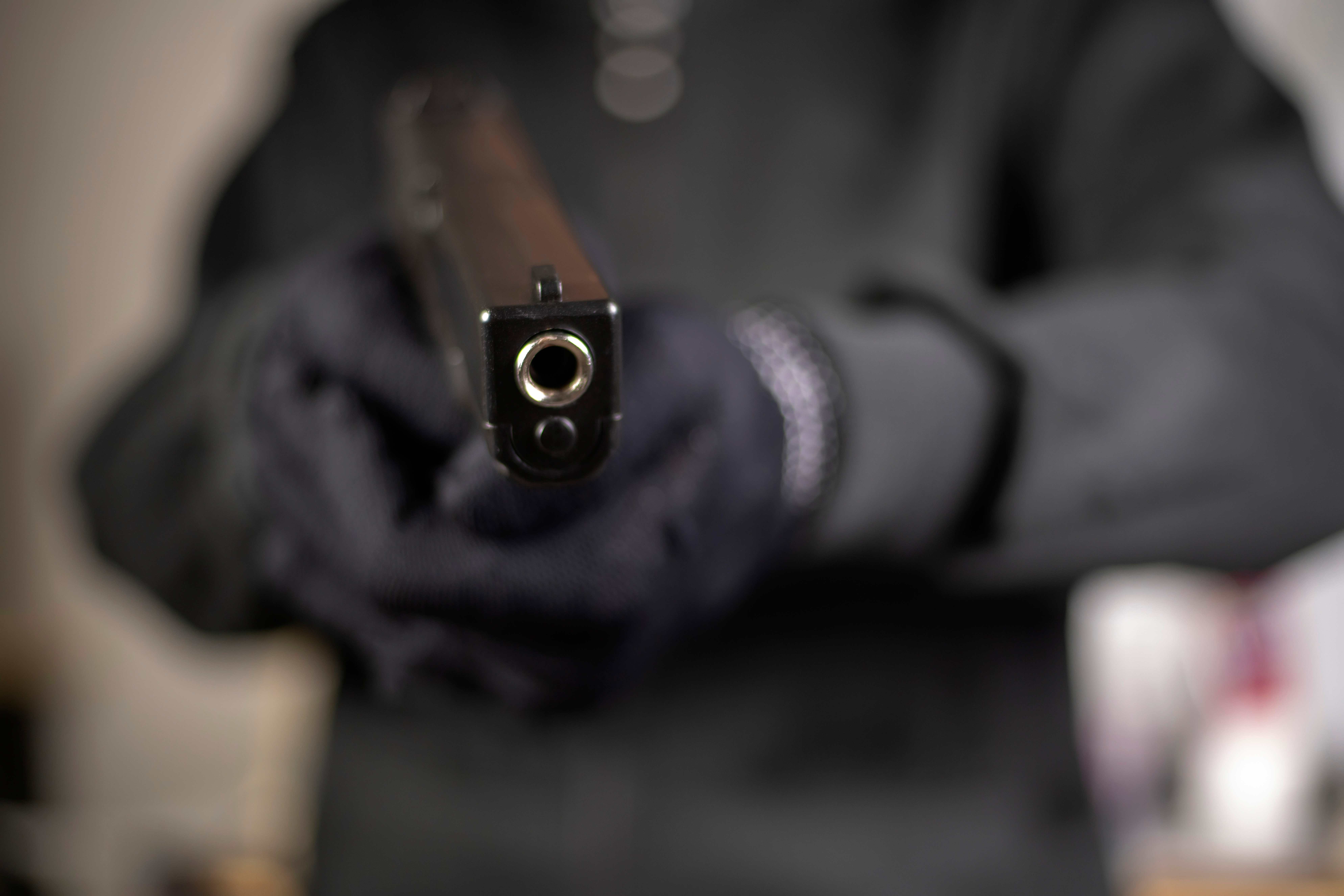 Armed,Robbers,Used,The,Gun,To,Robbery,The,Money,,Uses