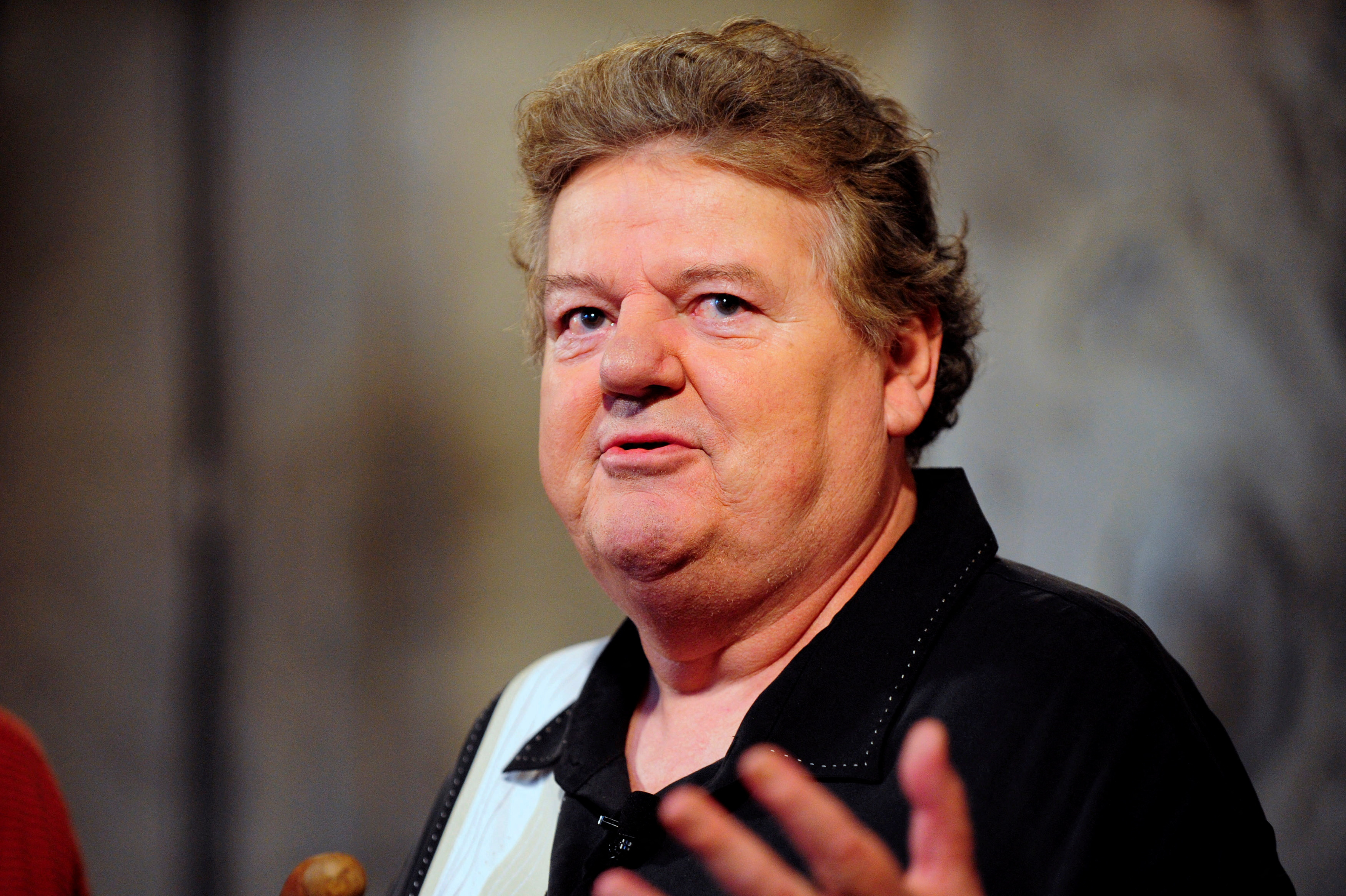 FILE PHOTO: Actor Robbie Coltrane talks during a media preview of The Wizarding World of Harry Potter-Diagon Alley at the Universal Orlando Resort in Orlando