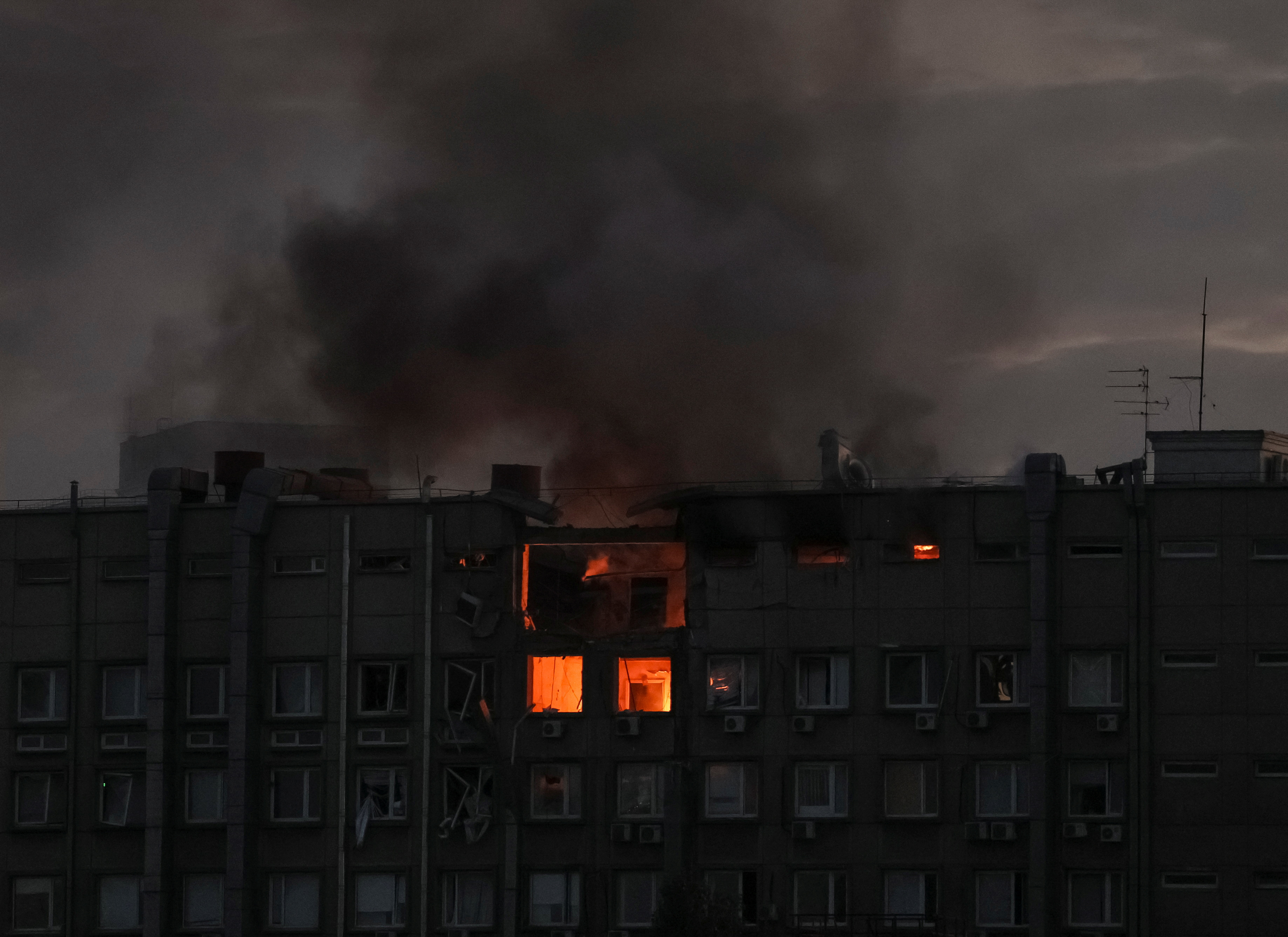 Smoke rises after a Russian drones strike in Kyiv