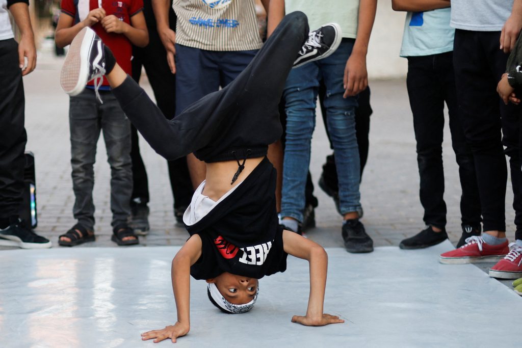 1666088259-2022-10-18T090107Z_46123295_RC231X9UIGGH_RTRMADP_3_PALESTINIANS-GAZA-BREAK-DANCE-1024x683.jpg