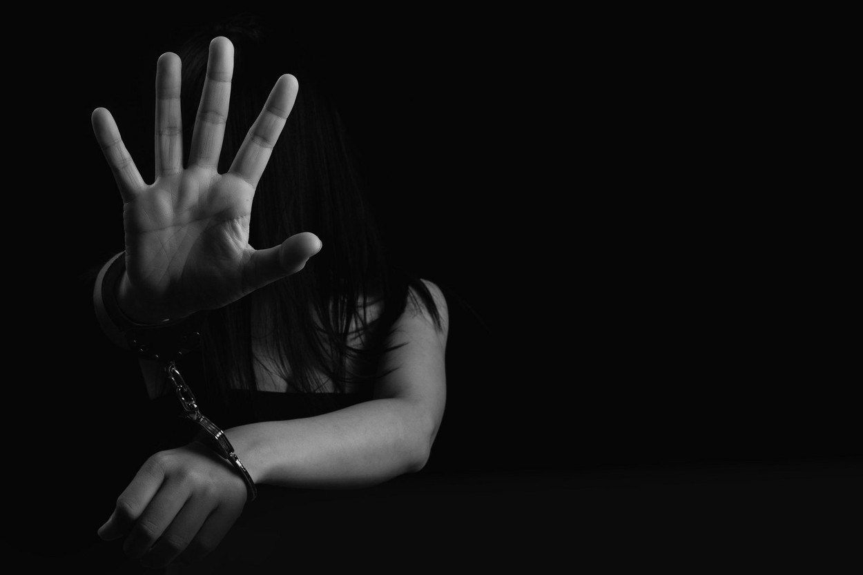 Human trafficking concept, End to violence against women.