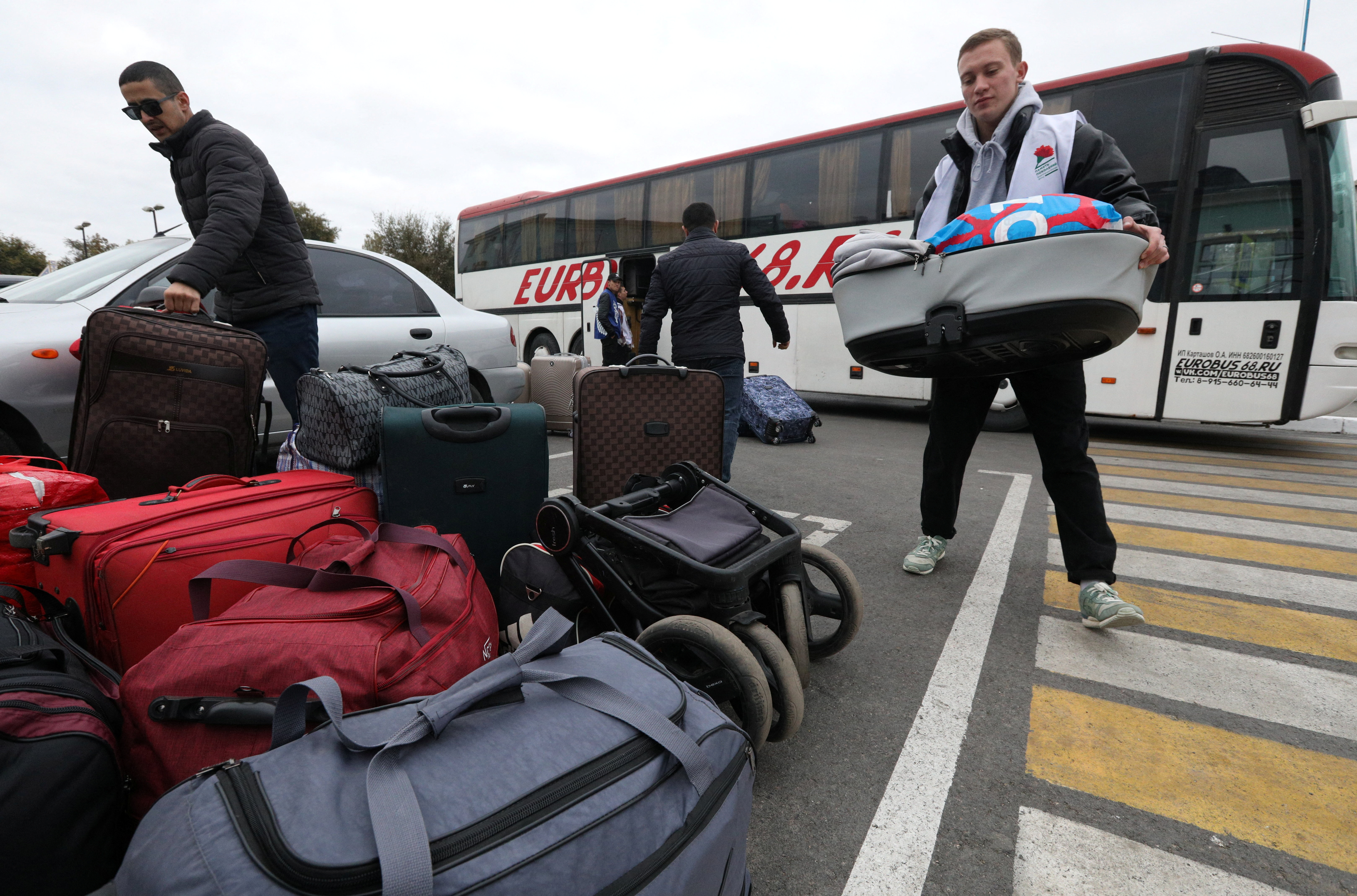 Civilians evacuated from the Russian-controlled Kherson region of Ukraine arrive in Dzhankoi