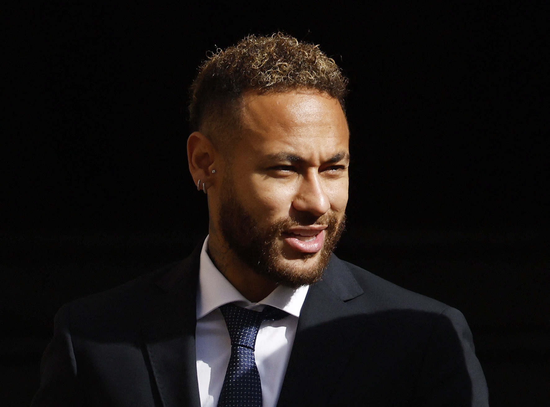 Brazil's Neymar to stand trial in a corruption case over his transfer to FC Barcelona