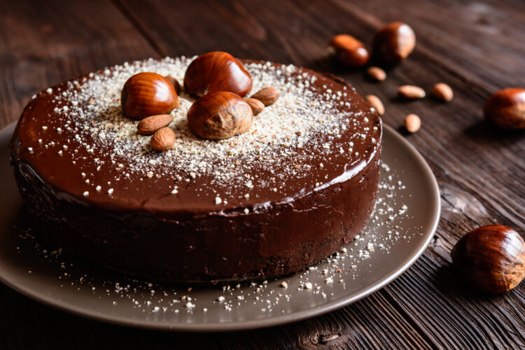 Delicious,Chestnut,Cake,With,Almonds,And,Chocolate,Glaze