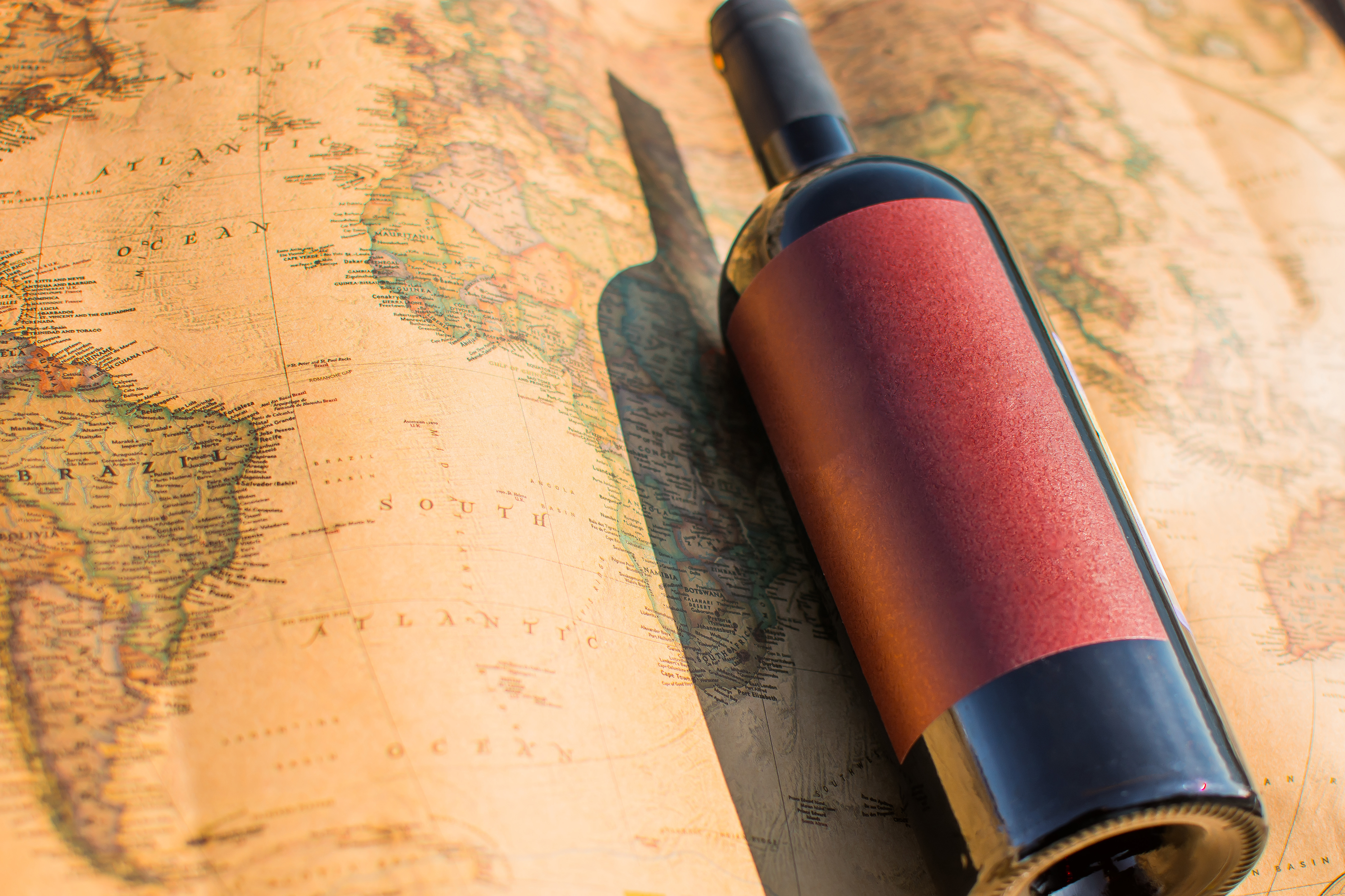 Wine,Bottle,On,World,Map,Background