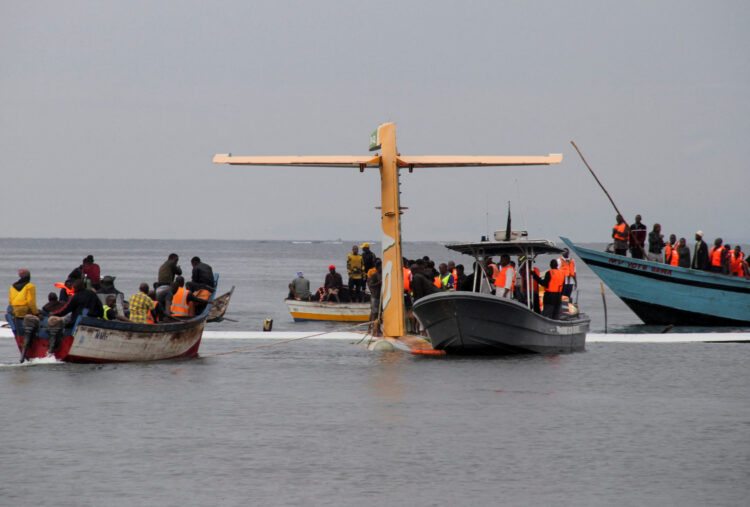 Rescuers attempt to recover the Precision Air passenger plane that crashed into Lake Victoria in Bukoba