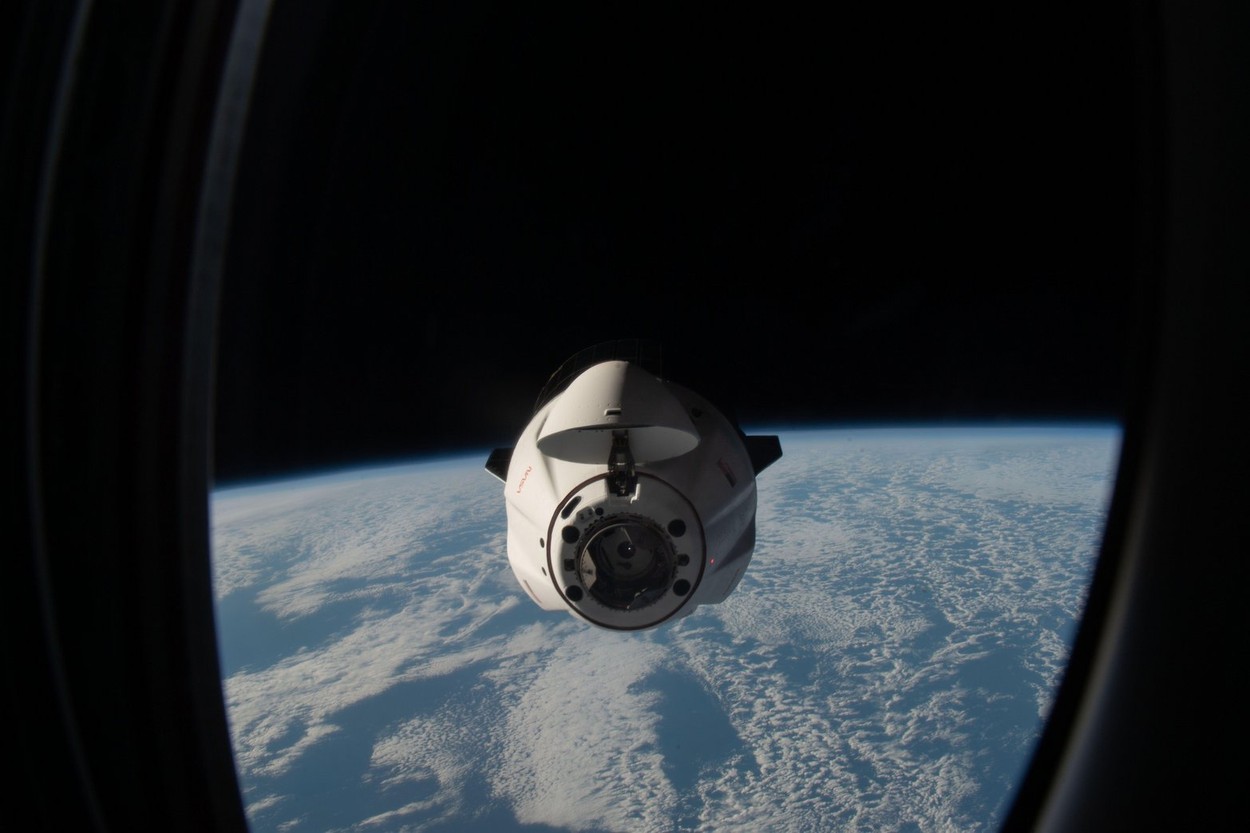 The SpaceX Dragon unmanned resupply spacecraft, approaches the International Space Station for docking with the Harmony module forward port, July 16, 2022 in Earth Orbit. The cargo ship is carrying over 5,800 pounds of science experiments fresh food and c