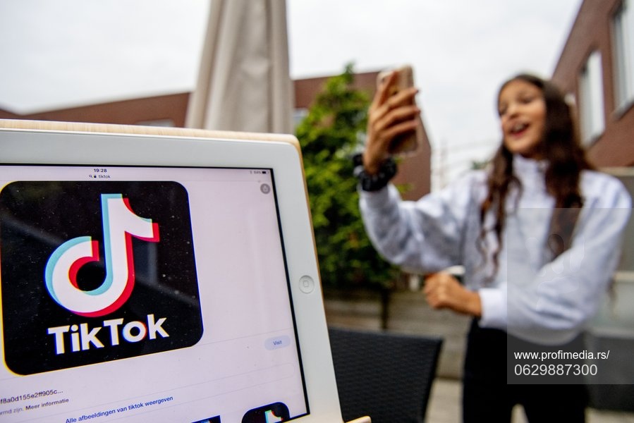 A child girl records a tik tok video, Rotterdam, Netherlands - 01 Sep 2021