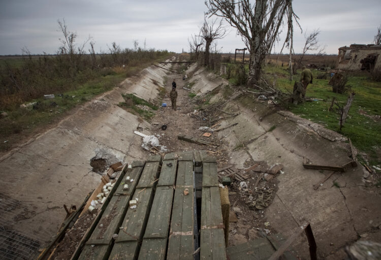 Ukrainian servicemen inspect captured Russian positions in Mykolaiv region