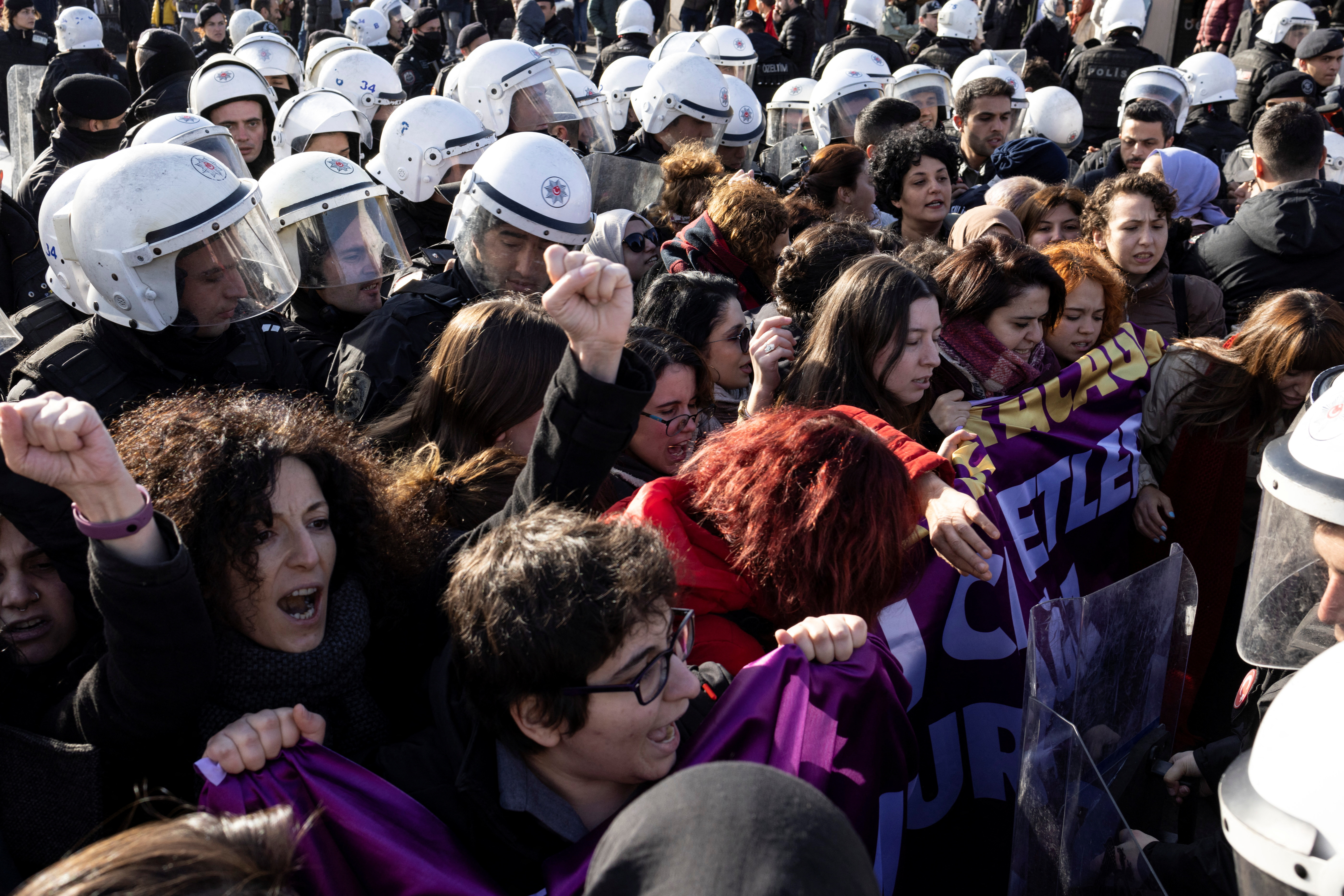 Demonstrators are surrounded and detained as they try to protest against gender-based violence in Istanbul
