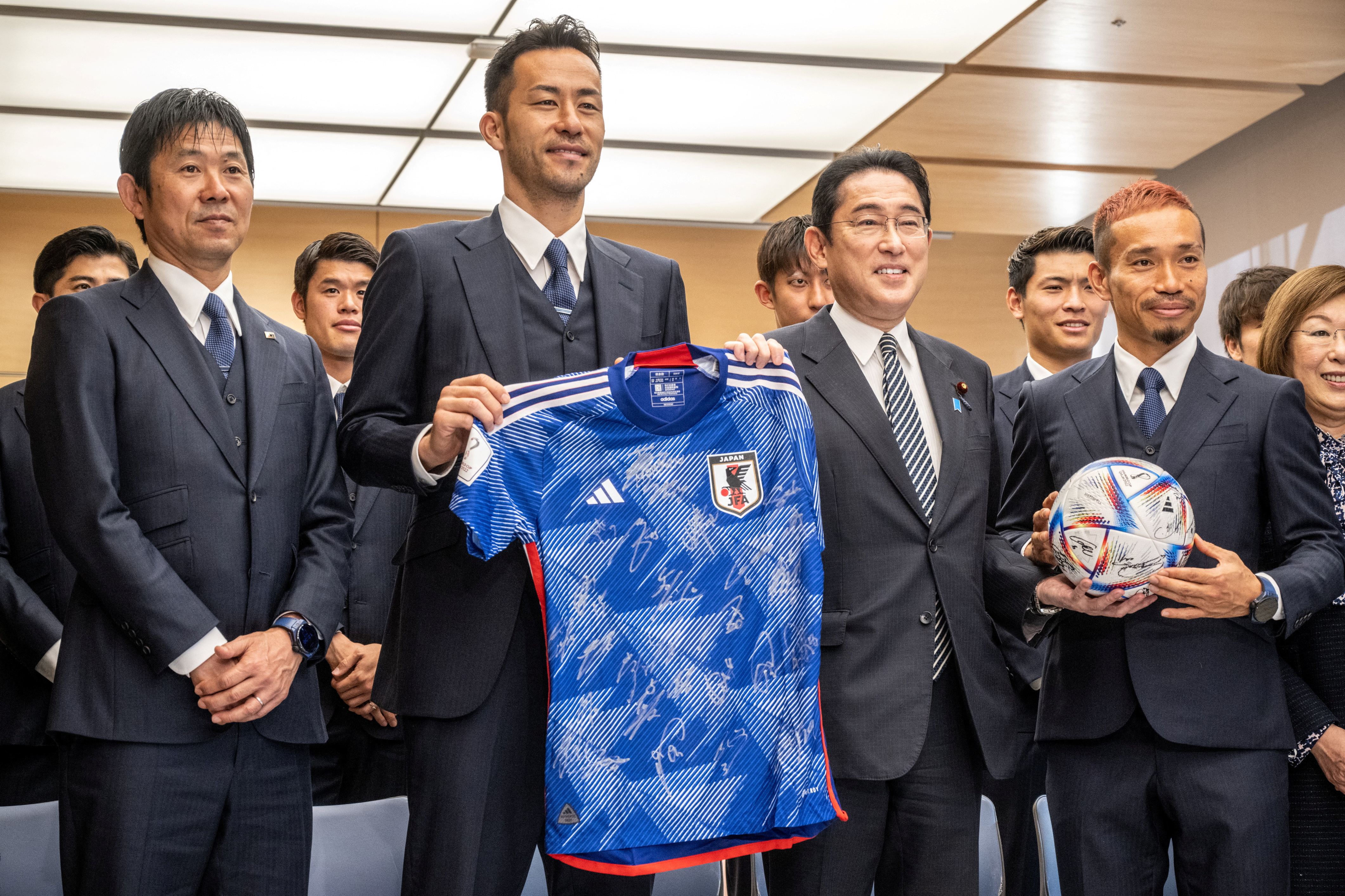 Japanese Prime Minister Kishida meets the national soccer team returned from the World Cup, in Tokyo