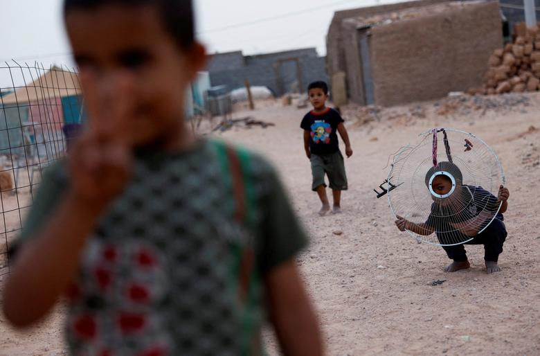 Sahravi djeca igraju se u izbjegličkom kampu Smara, u Tindoufu, Alžir, 21. maja. REUTERS/Borja Suarez