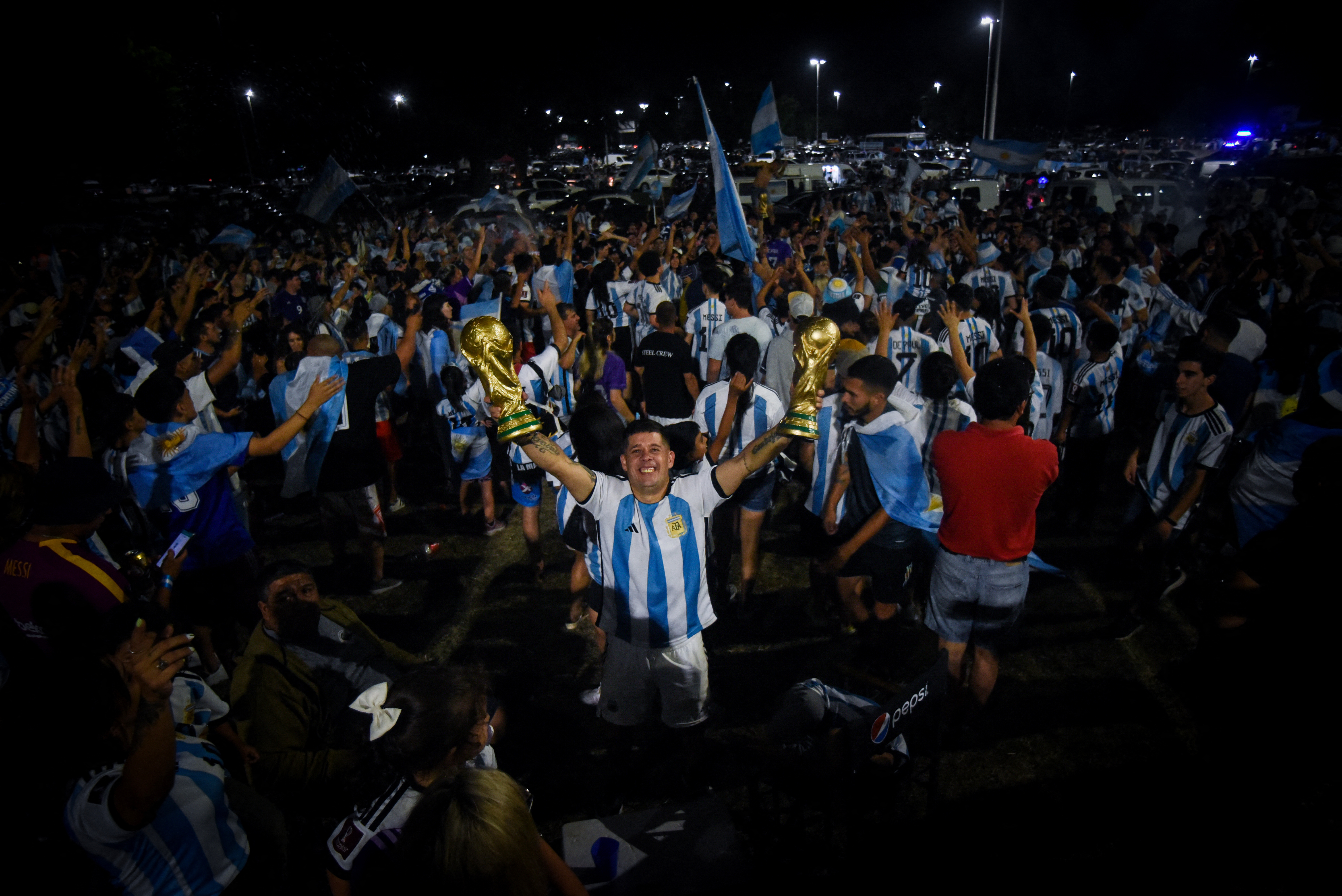 Fans in Buenos Aires celebrate after winning the World Cup