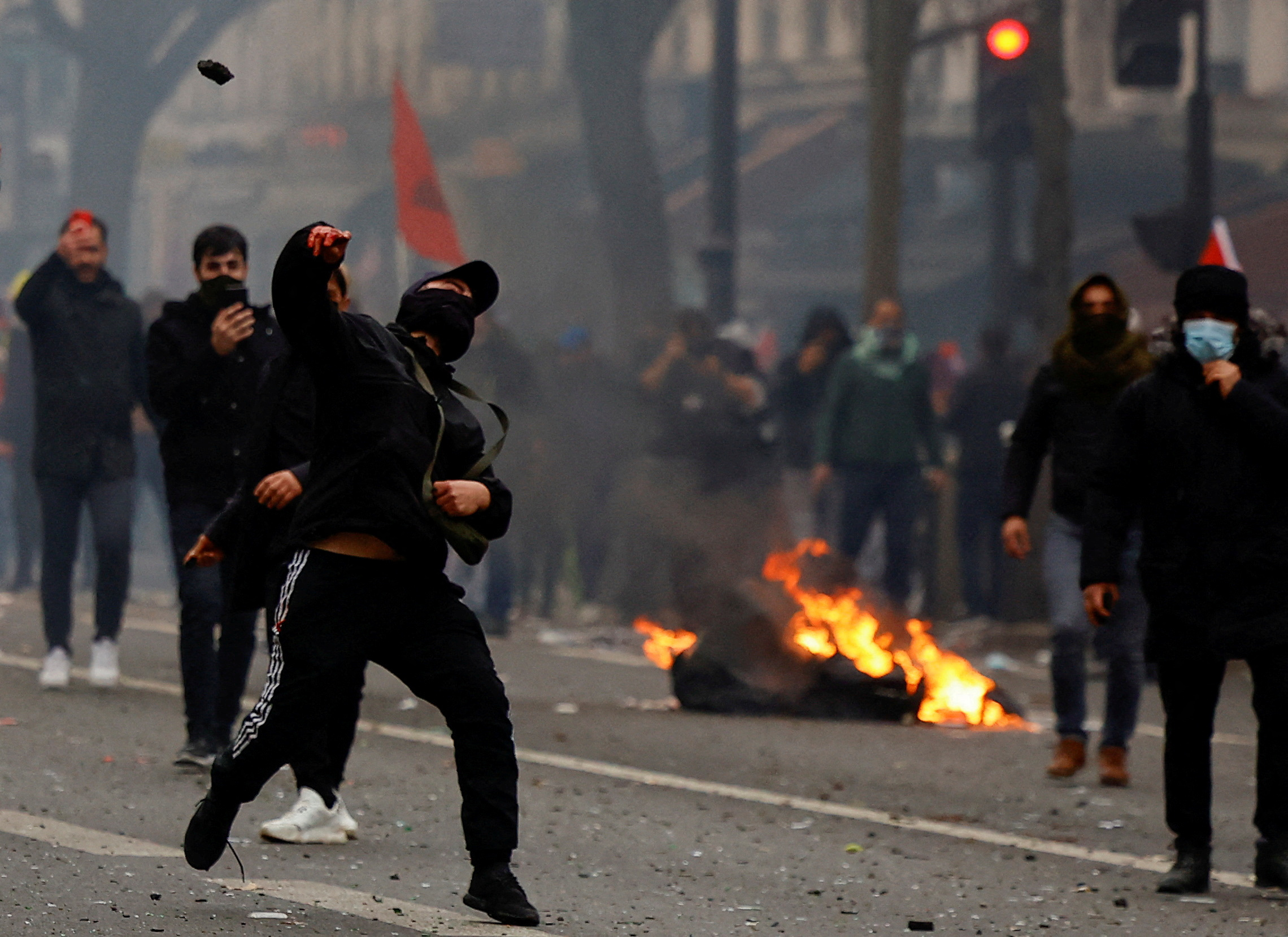 Members of the Kurdish community gather at the Place de la Republique square following the shooting, in Paris