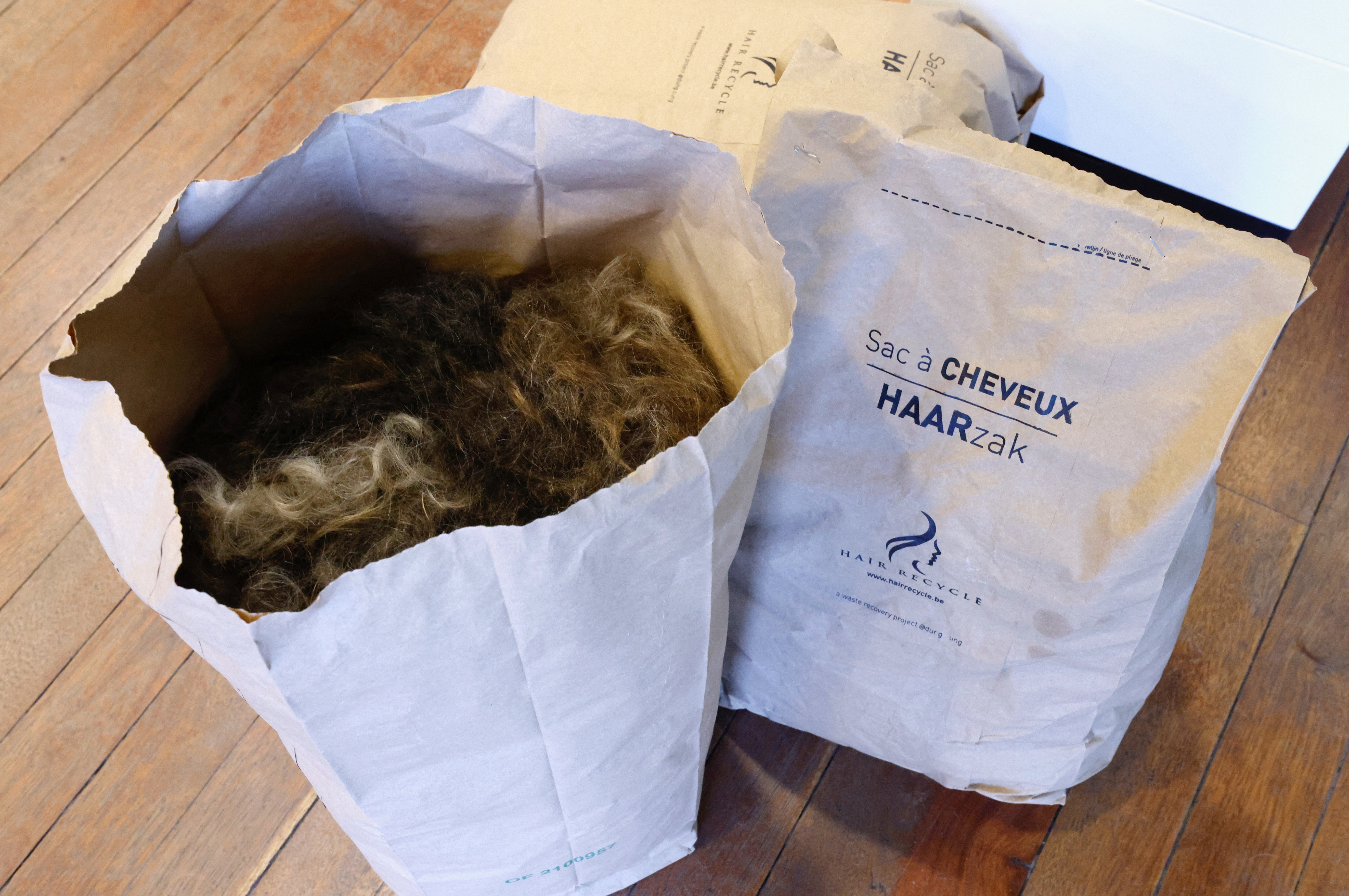Human hair recycled to clean waterways in Belgium