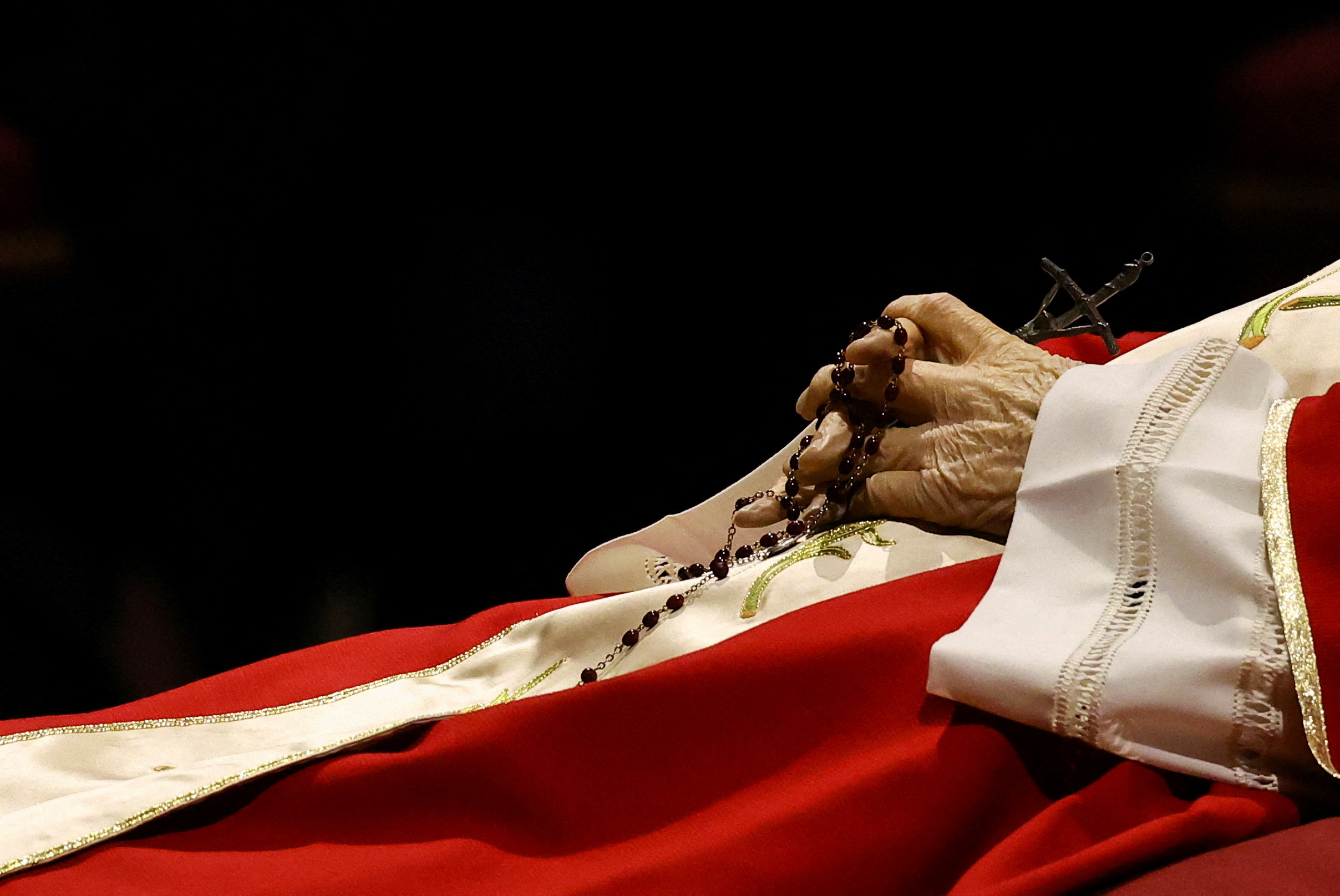 Faithful pay homage to former Pope Benedict in St. Peter's Basilica at the Vatican
