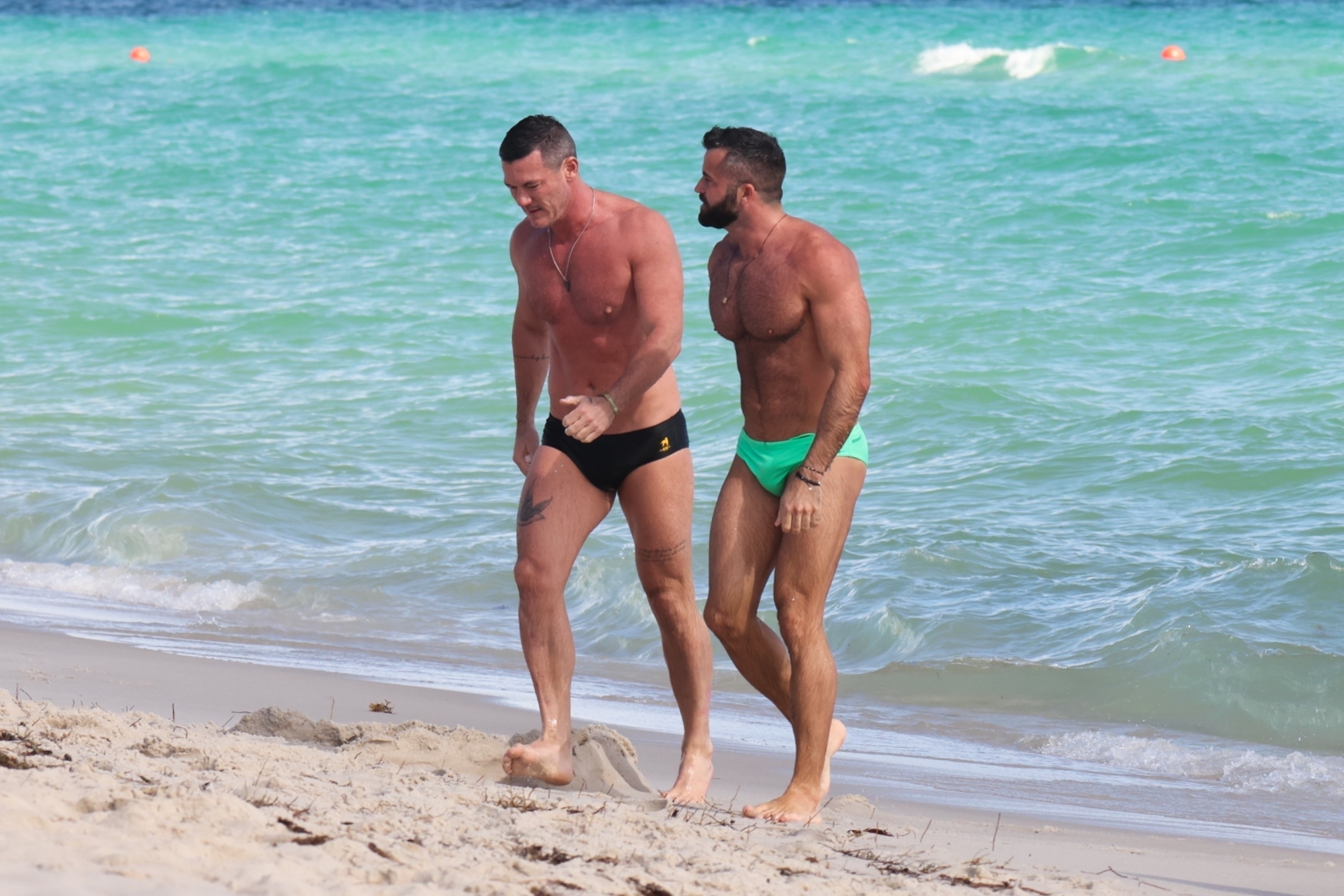 *EXCLUSIVE* Luke Evans hits the beach with his hunky boyfriend Fran Tomas in Miami!