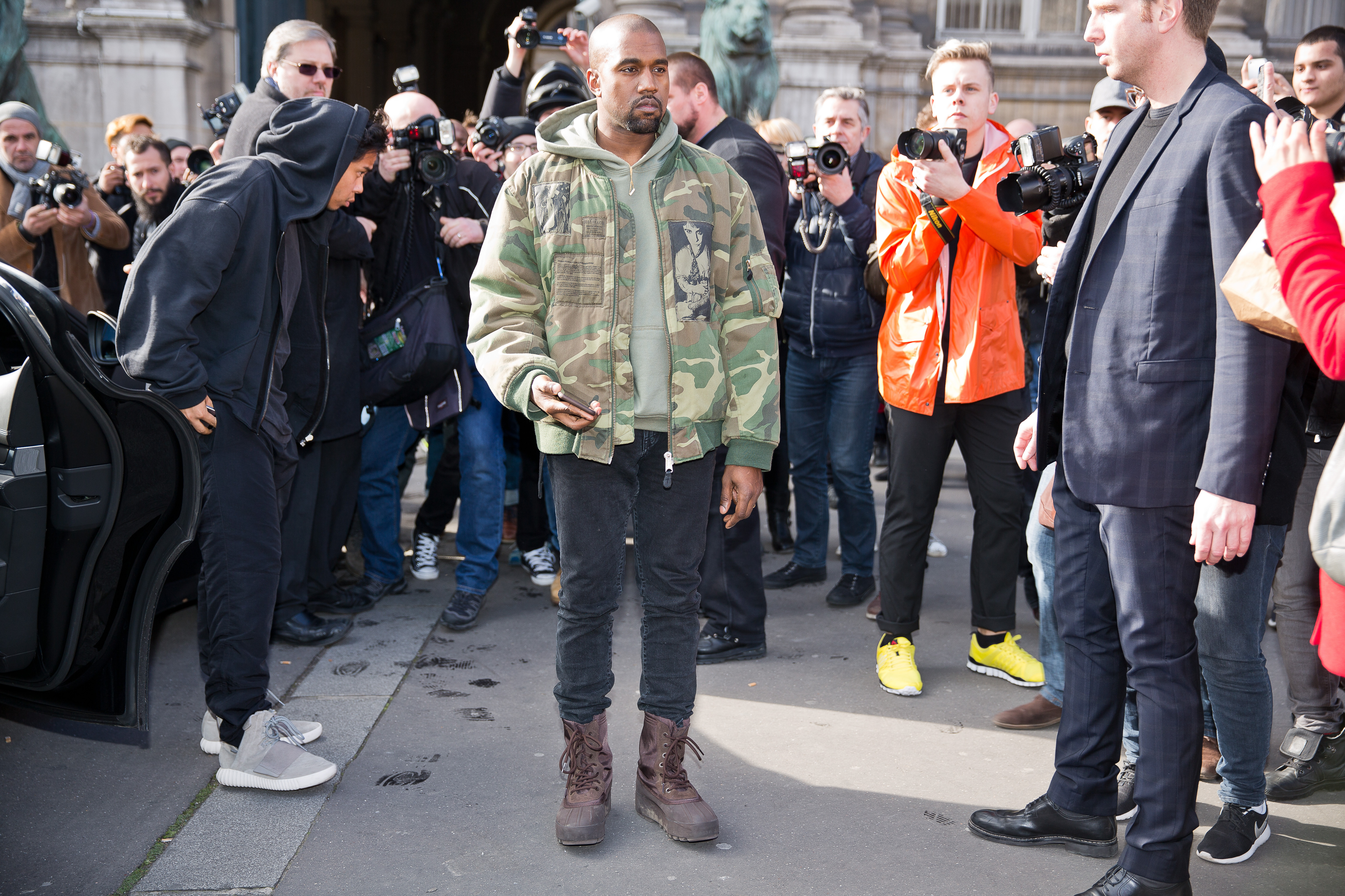Paris-march,4,,2015.,Kanye,West,Posing,For,Photographers,In,Front
