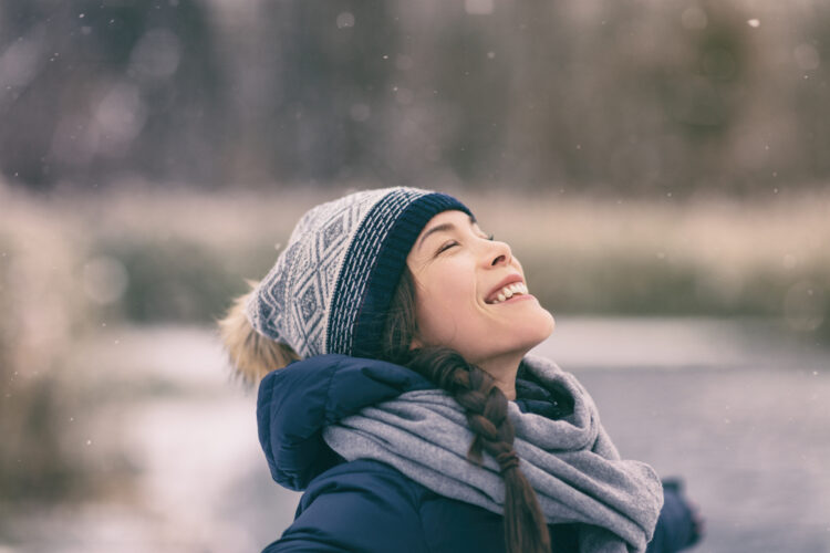 Winter,Woman,Happy,Enjoying,Snow,Falling,On,Face,Outdoor,Forest