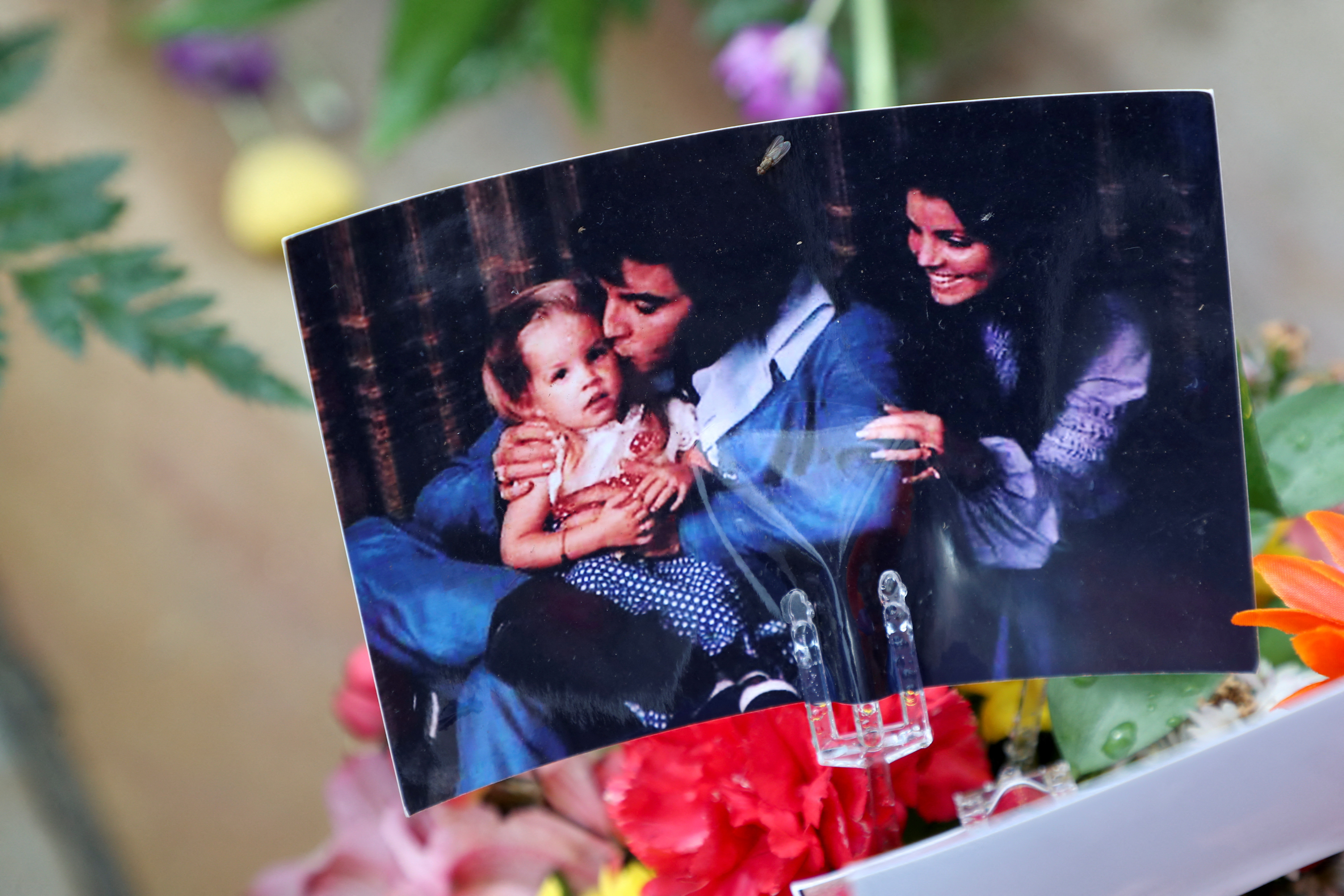 Music fans attend a public memorial for singer Lisa Marie Presley at Graceland in Memphis