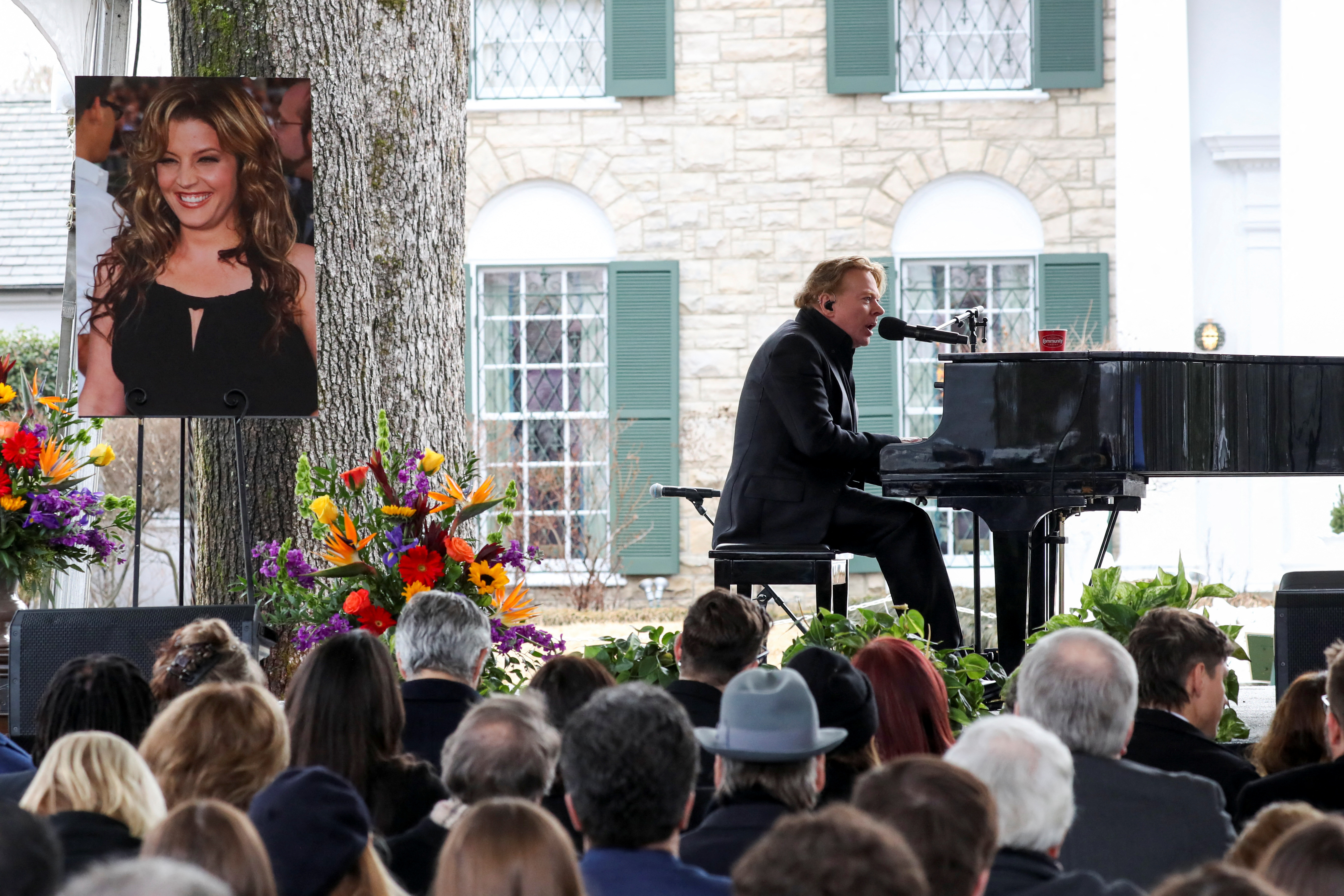 Music fans attend a public memorial for singer Lisa Marie Presley at Graceland in Memphis