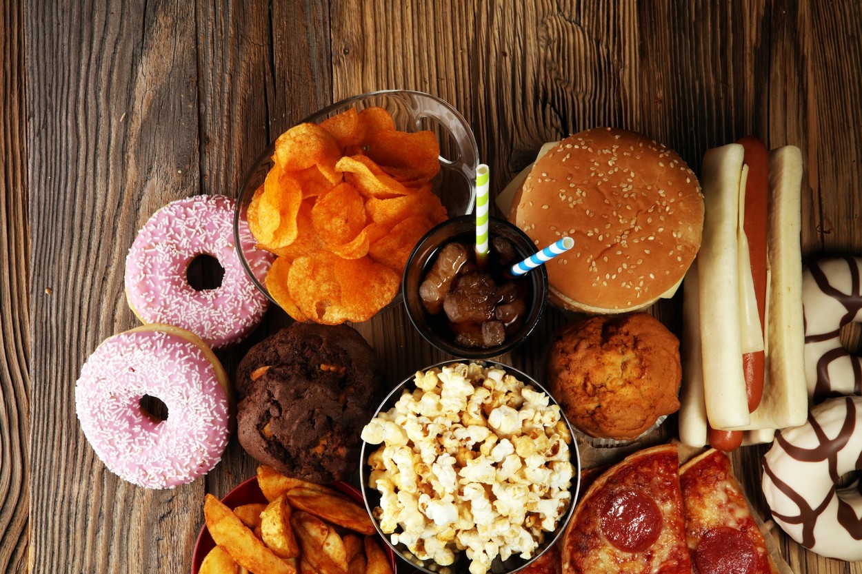 Unhealthy products. food bad for figure, skin, heart and teeth. Assortment of fast carbohydrates food. American unhealthy food.