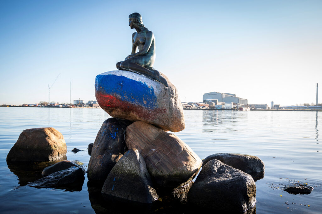 Little Mermaid sculpture has Russian flag colours painted on it in Copenhagen