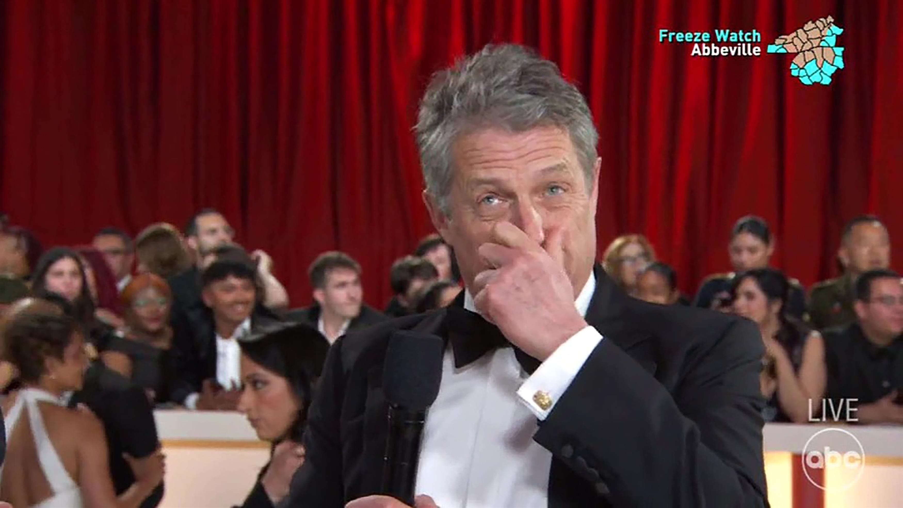 Hugh Grant gives incredibly awkward and 'rude' Oscars red carpet interview