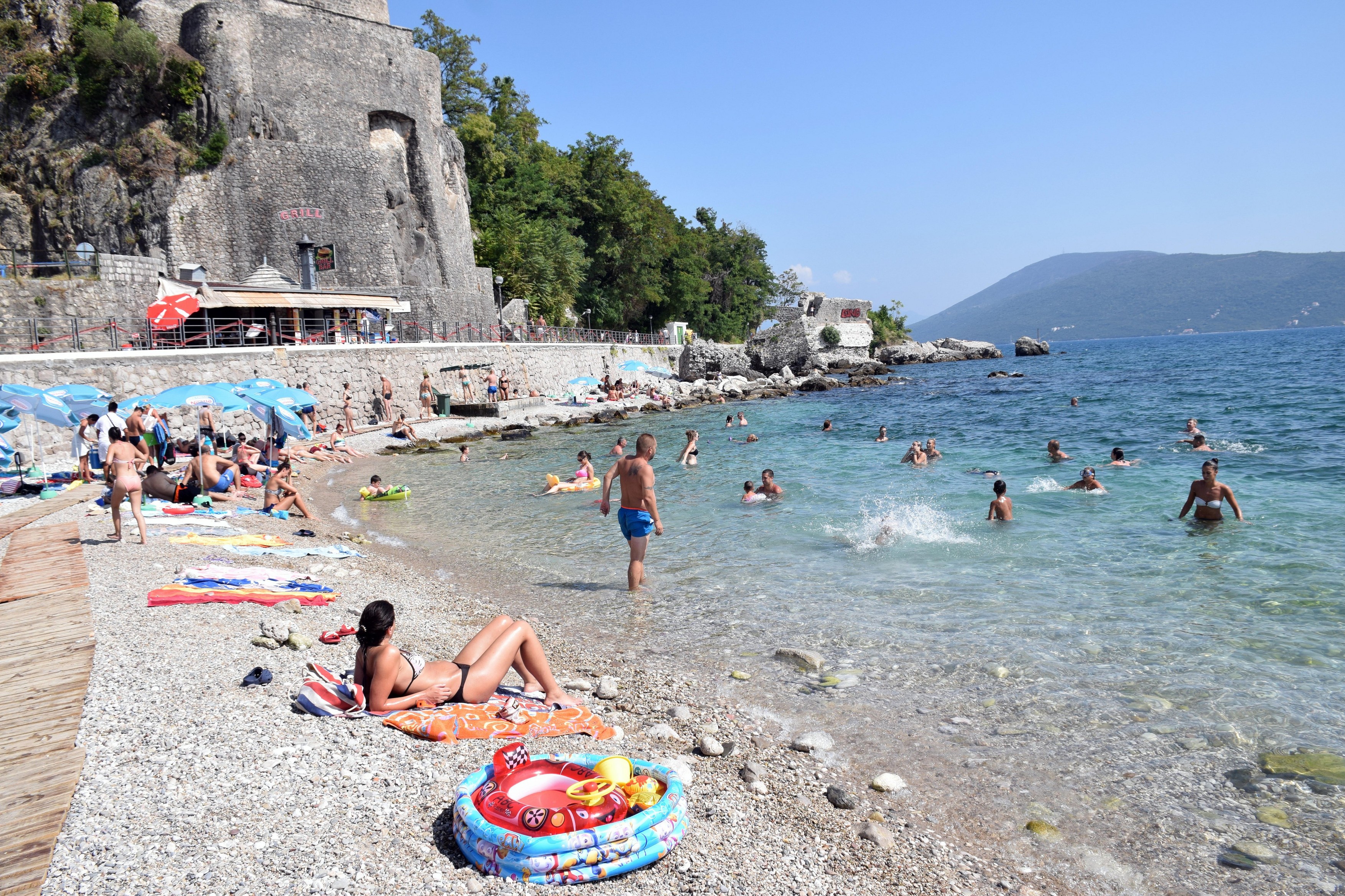 Herceg-Novi beach, Montenegro. Forte Mare in the background. Aug 2018