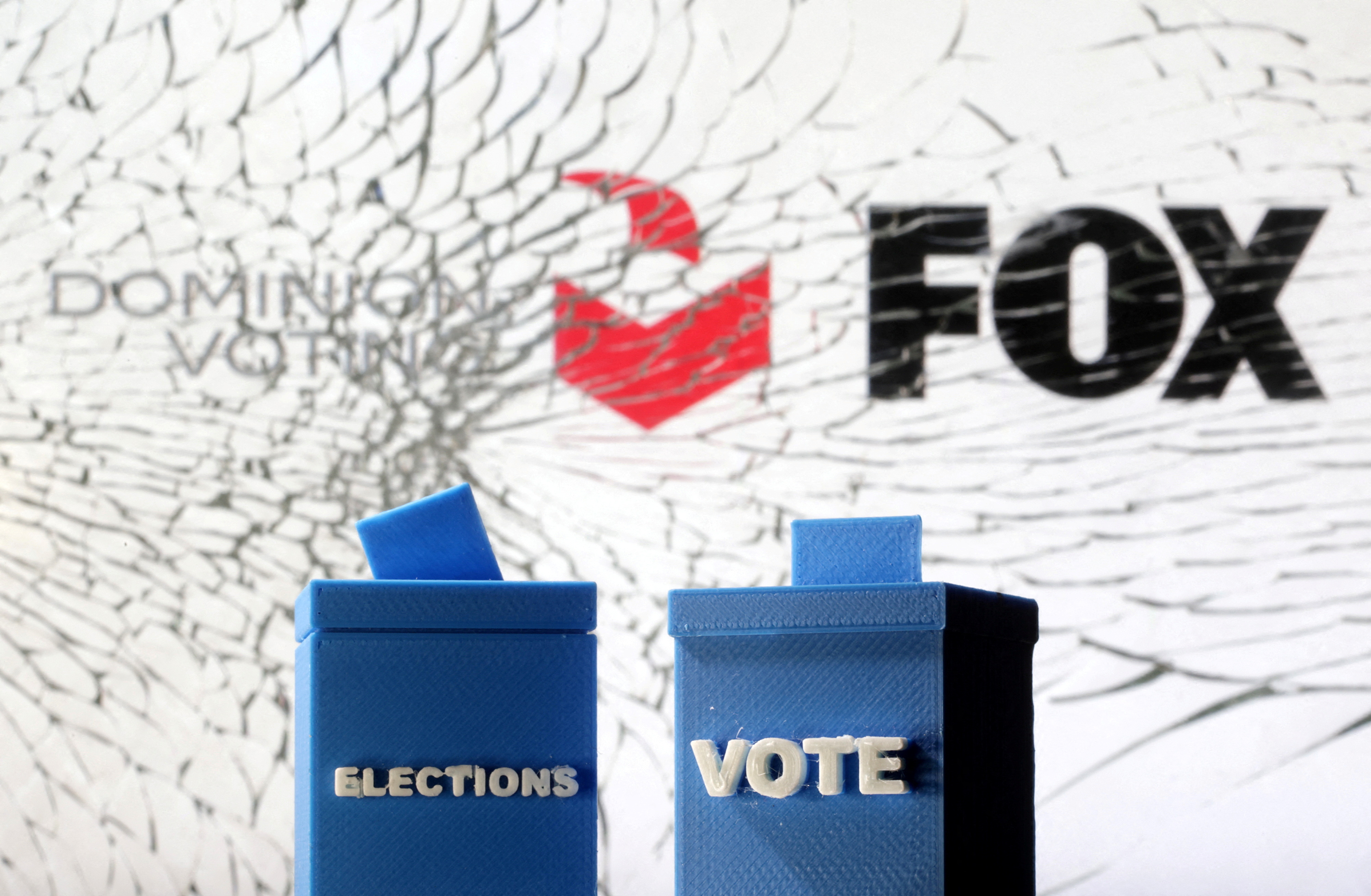 FILE PHOTO: Illustration shows Dominion Voting Systems and Fox logos