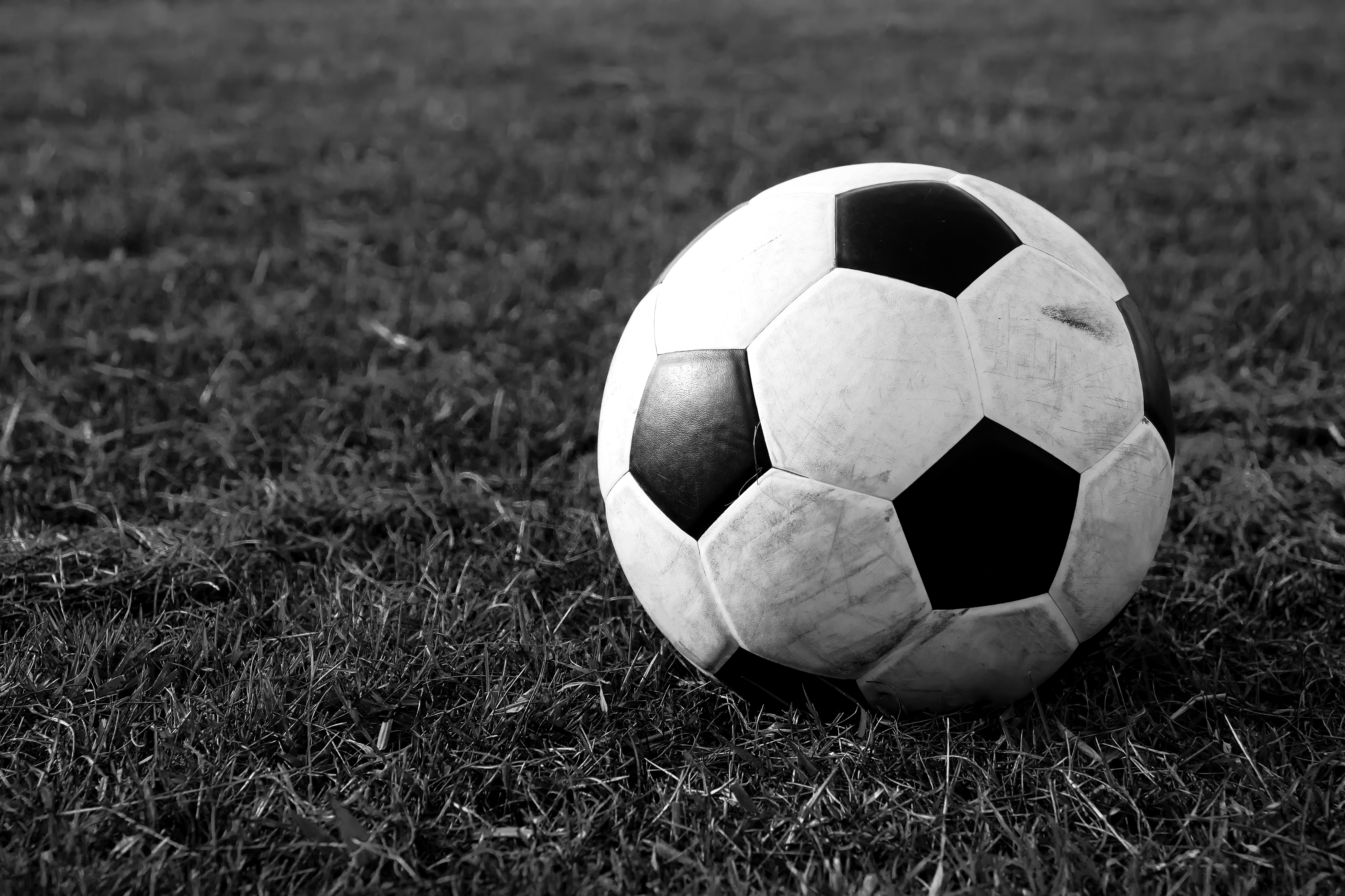 A,Ball,In,Football,Field,With,Black,And,White