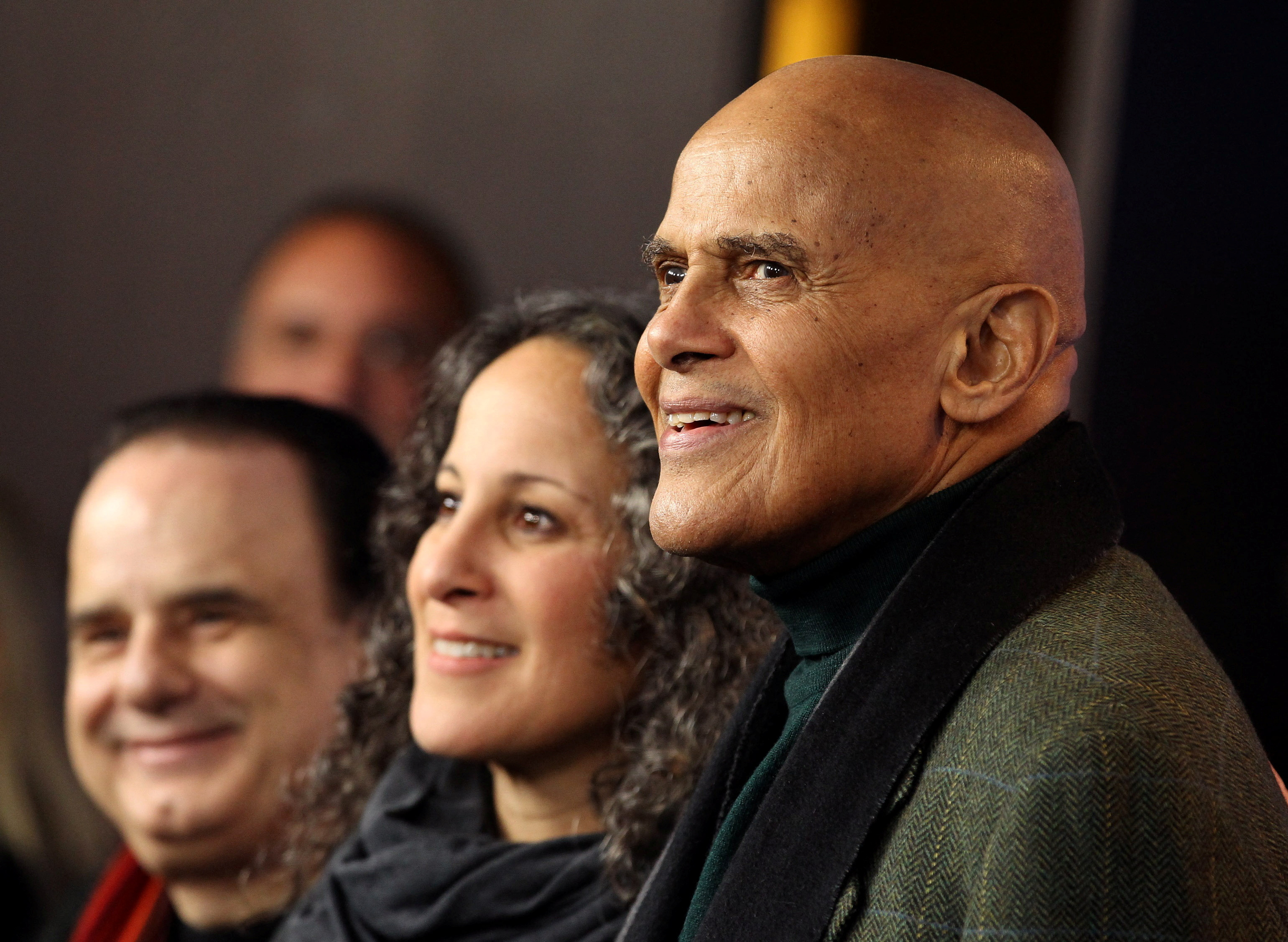 FILE PHOTO: Singer Belafonte poses with producers Belafonte and Nasso during photocall to promote movie 'Sing Your Song' at 61st Berlinale International Film Festival in Berlin