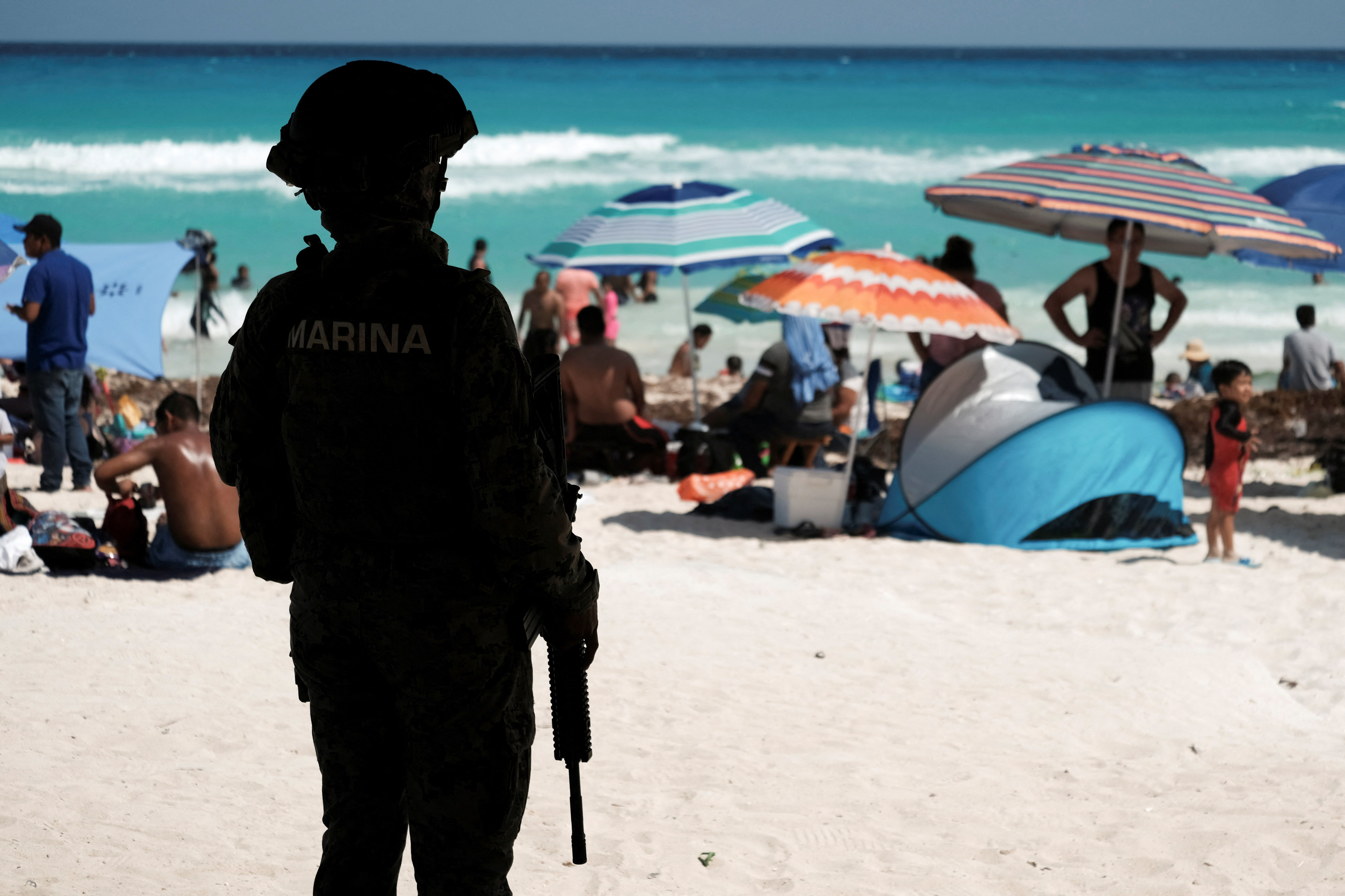 Mexican Marines patrol at Gaviota Azul beach during Holy Week in Cancun