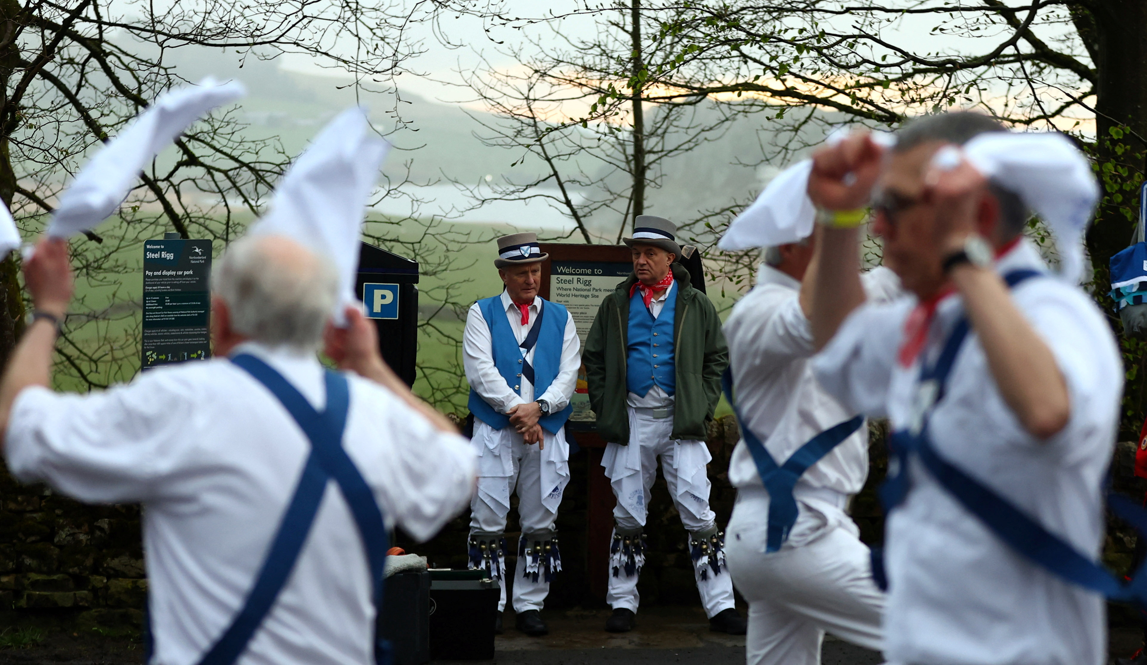 Members of Hexham Morrismen perform at sunrise to traditionally mark May Day in Henshaw