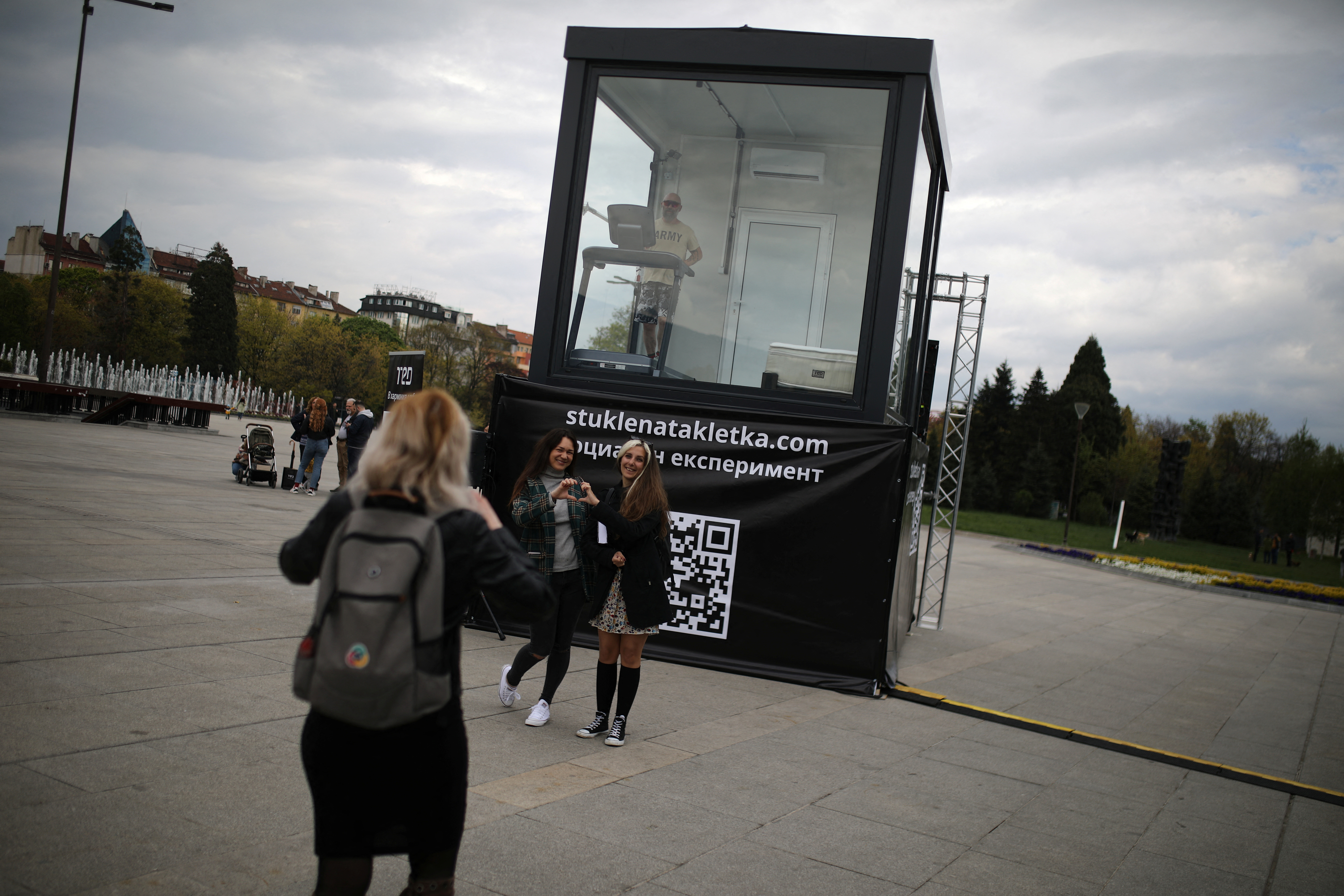 Bulgarian ultramarathon runner self-isolates in a glass cage as part of a social experiment aimed to raise donations, in Sofia