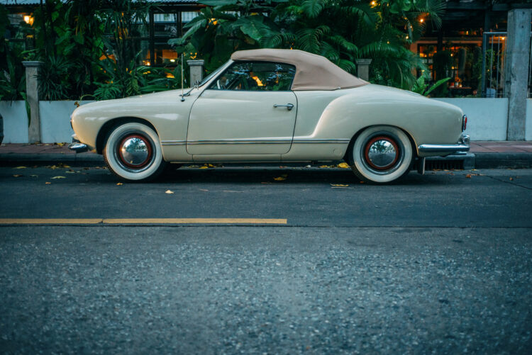 Old,Vintage,Convertible,Roadster,Car,Parked,On,The,Street.,Side