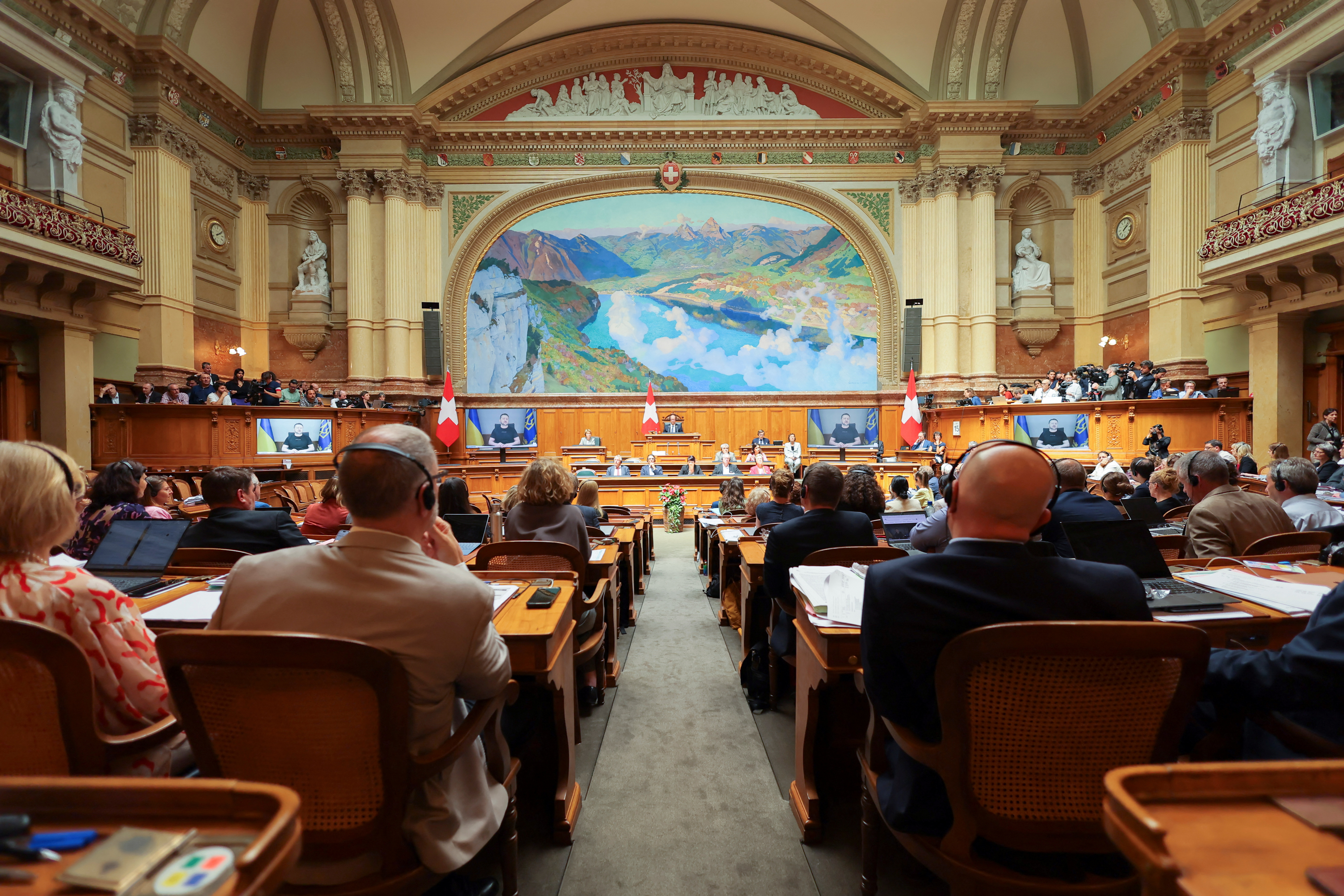 Ukraine's President Volodymyr Zelenskiy addresses Swiss Parliament via video message, in Bern
