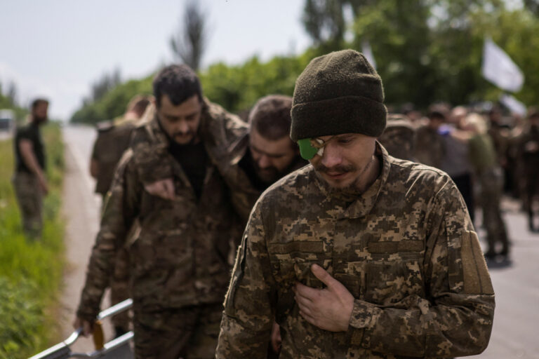 Ukrainian prisoners of war (POWs) are seen after a swap in Donetsk region