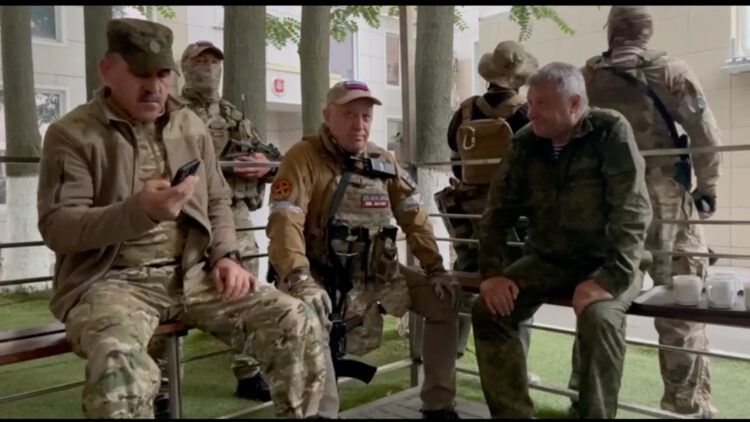Founder of Wagner private mercenary group Yevgeny Prigozhin and Russian Wagner Group fighters at the headquarters of the Southern Military District of the Russian Armed Forces in Rostov-on-Don