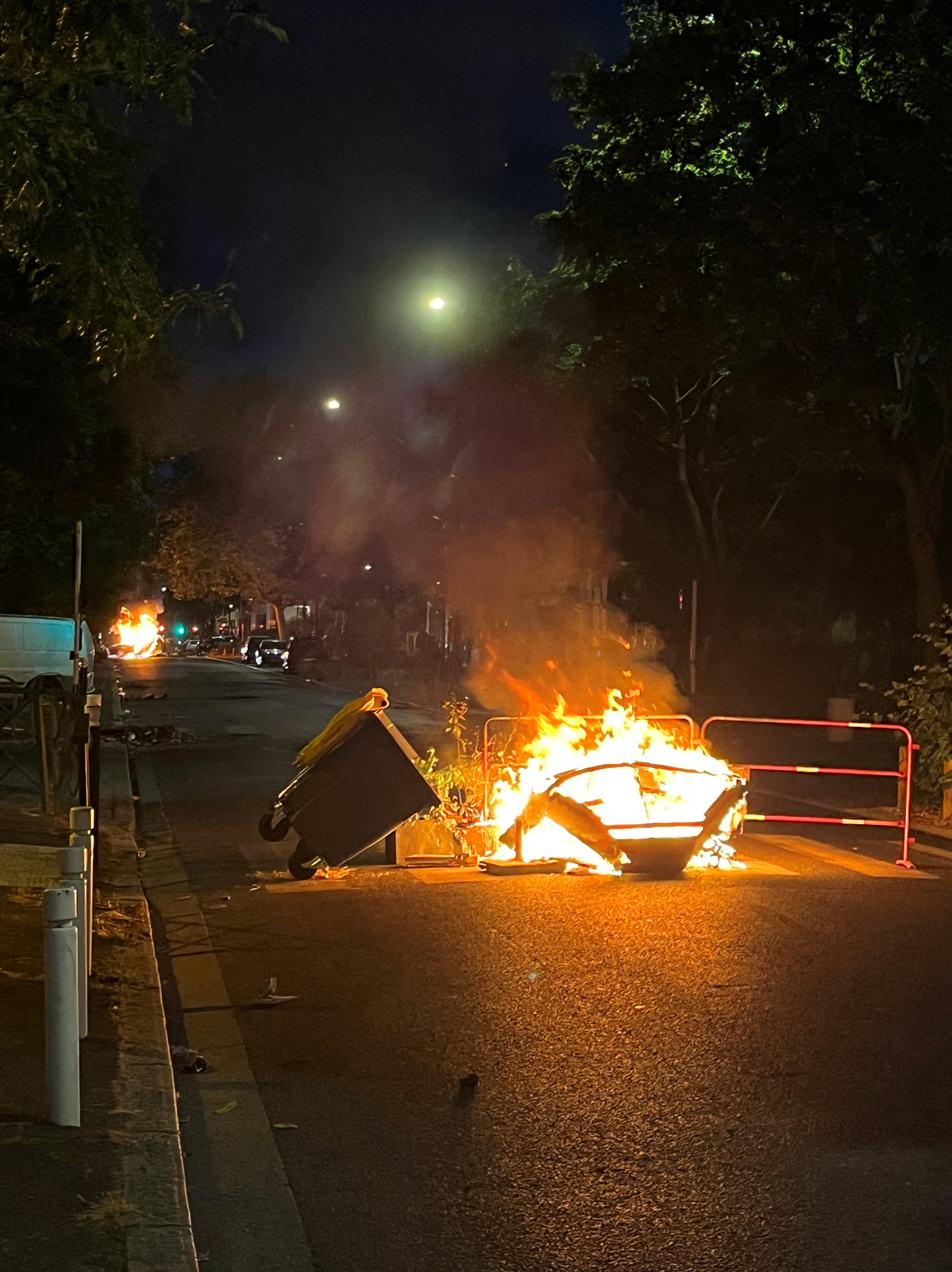 Youths clash with police near Paris after teenager shot dead in traffic stop