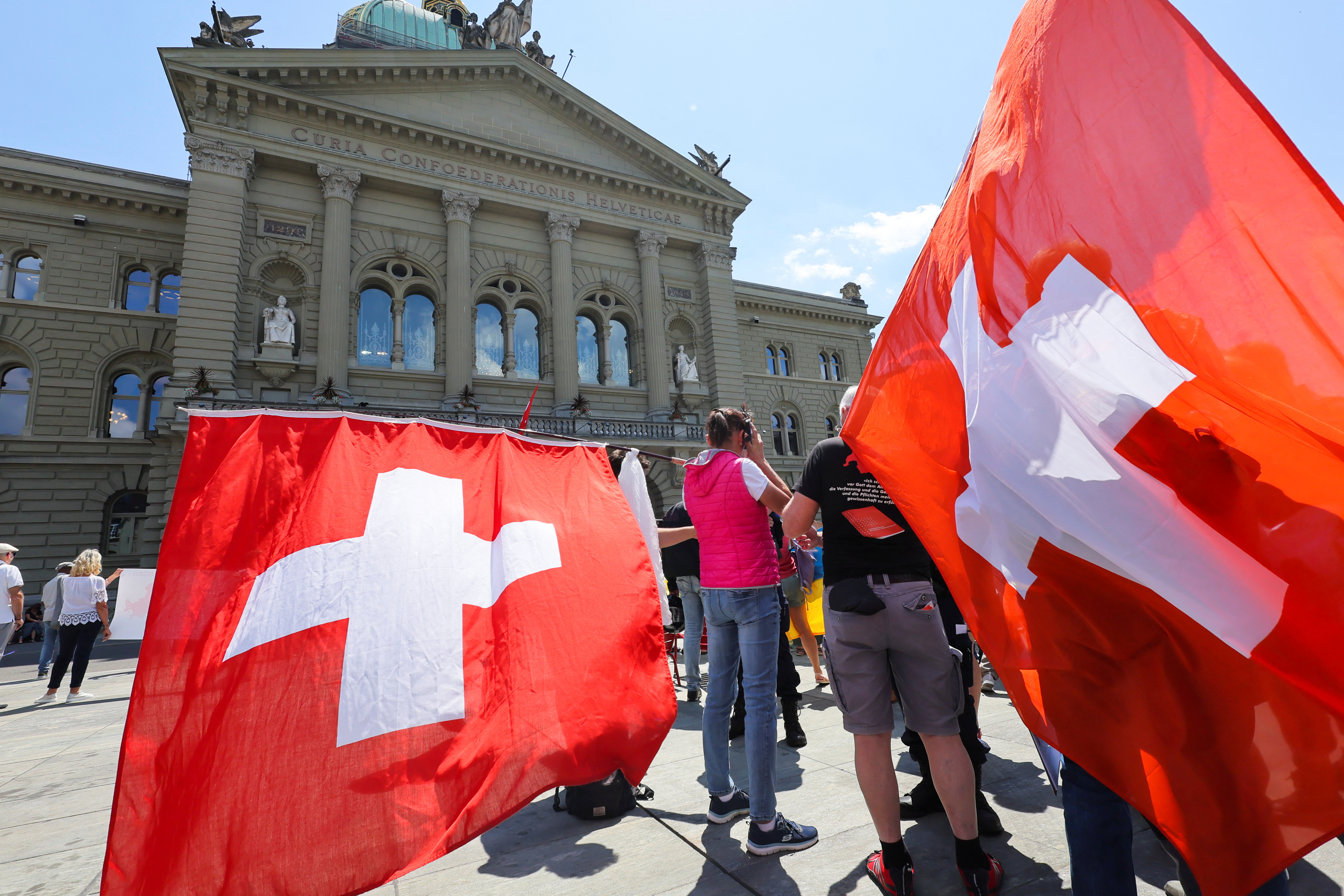 Ukraine's President Volodymyr Zelenskiy addresses Swiss Parliament via video message, in Bern