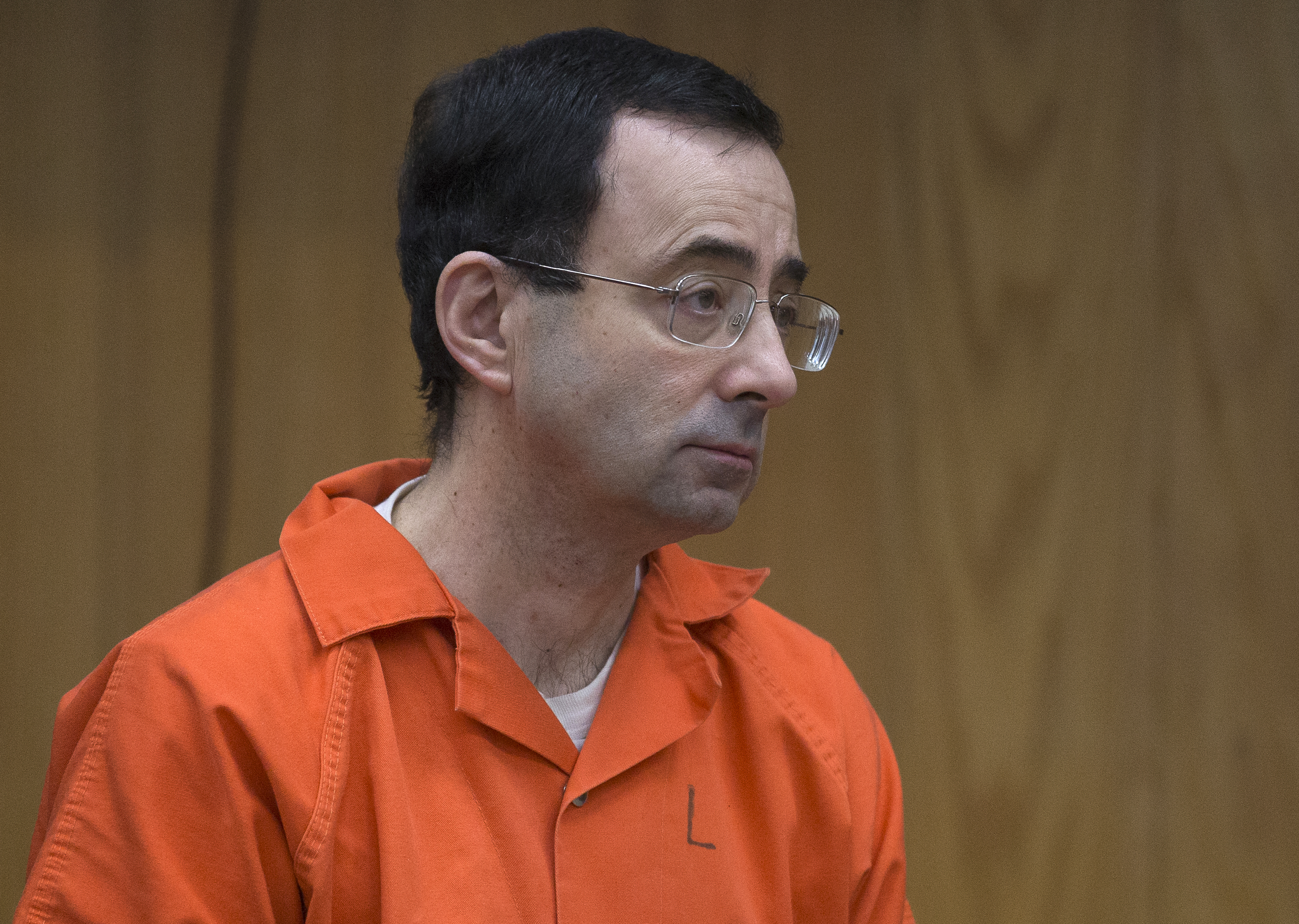 Former Michigan State University and USA Gymnastics doctor Larry Nassar appears in court for his final sentencing phase in Eaton County Circuit Court