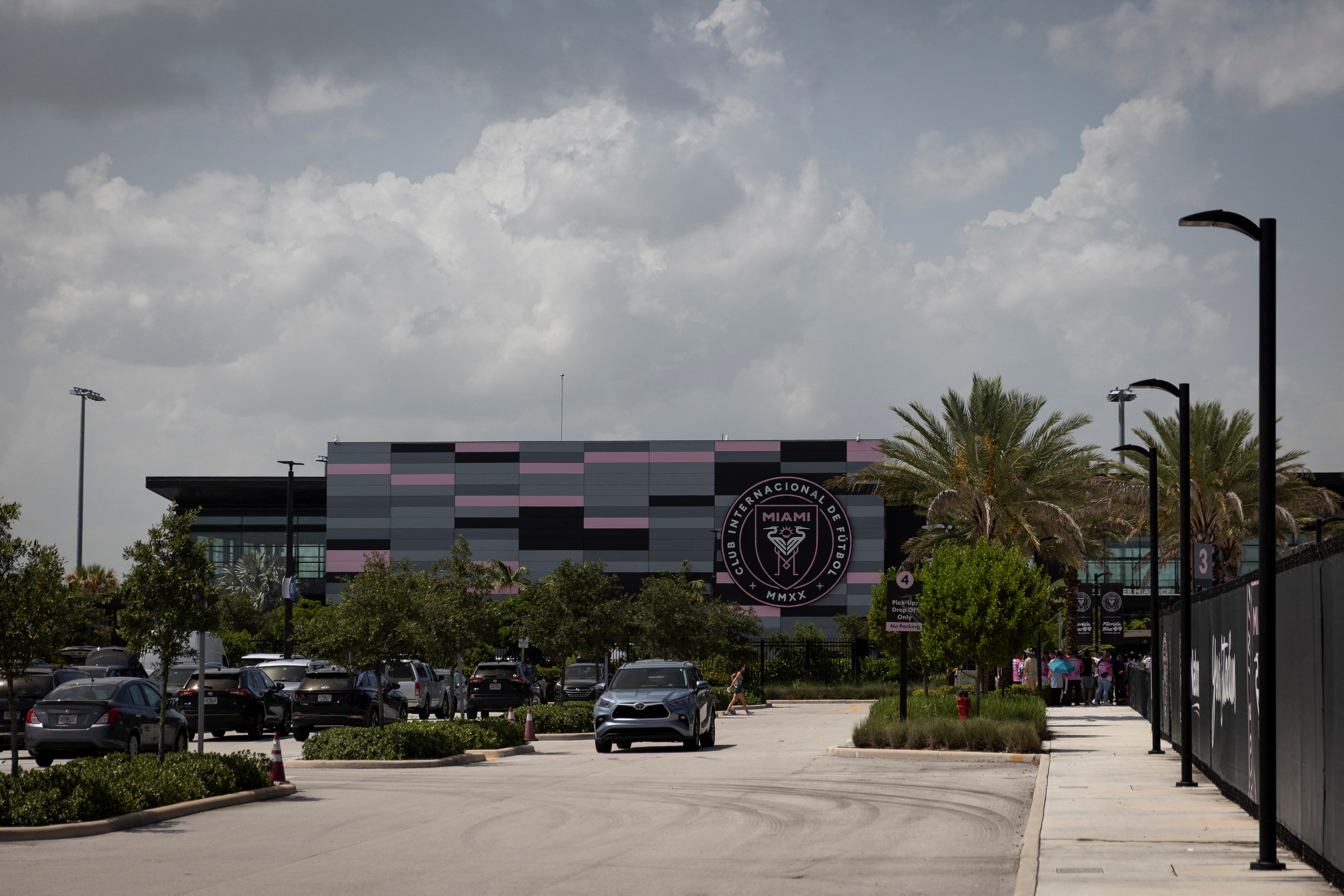 Supporters of Argentinian soccer player Leo Messi gather outside the Inter Miami DRV Pnk Stadium, in Fort Lauderdale